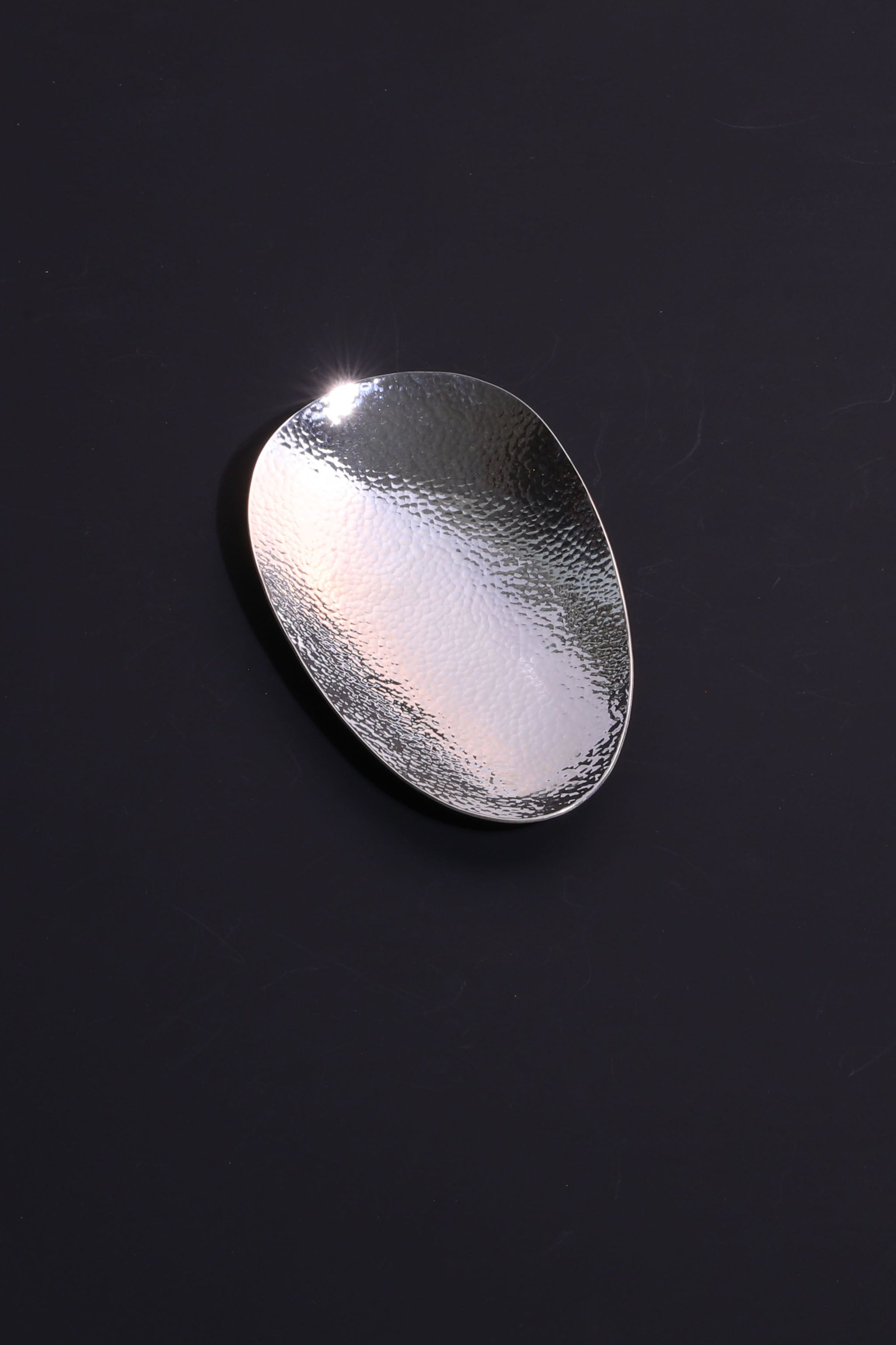 A piece of silver tea scoop