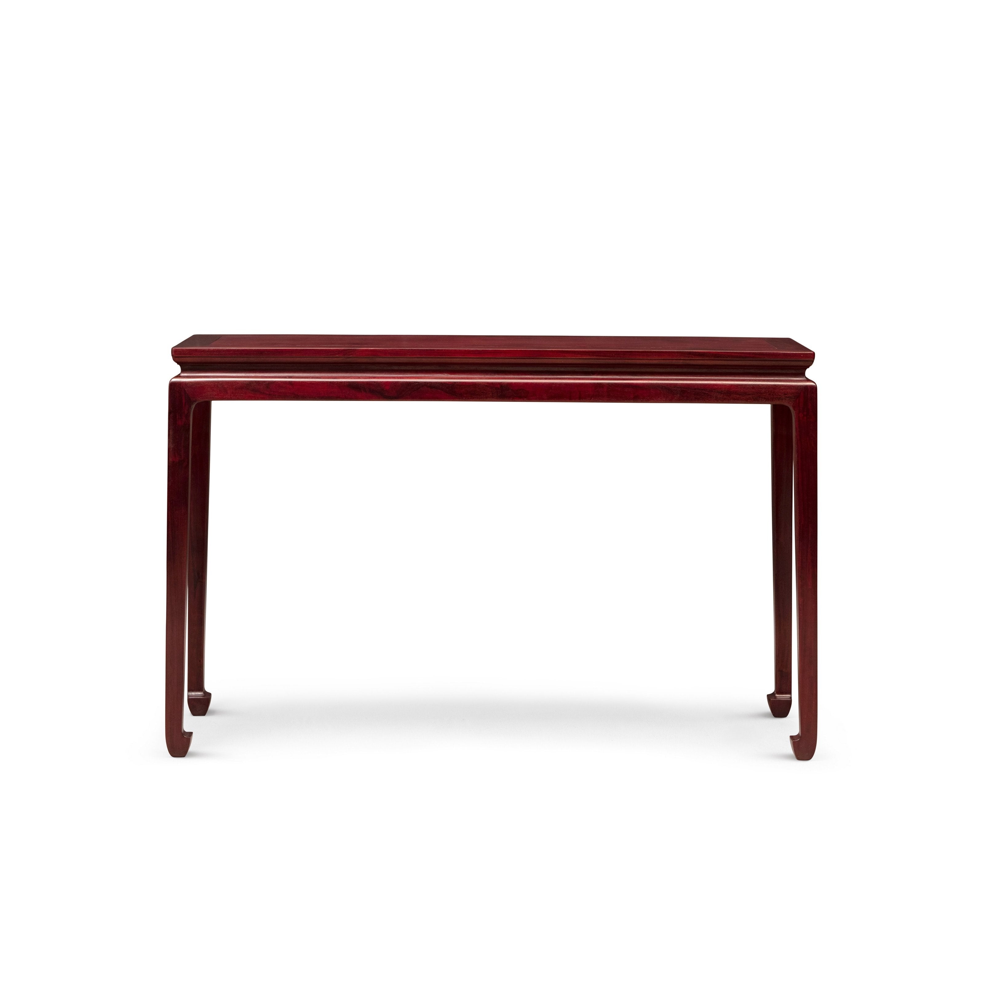 Long table with waisted legs and hoof feet