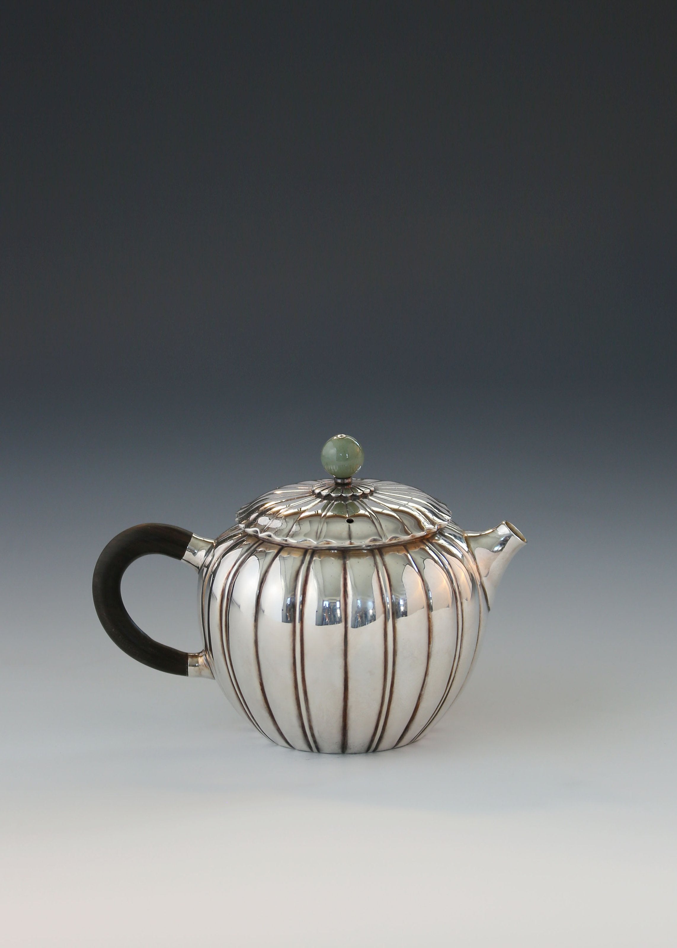Jade-patterned sterling silver teapot