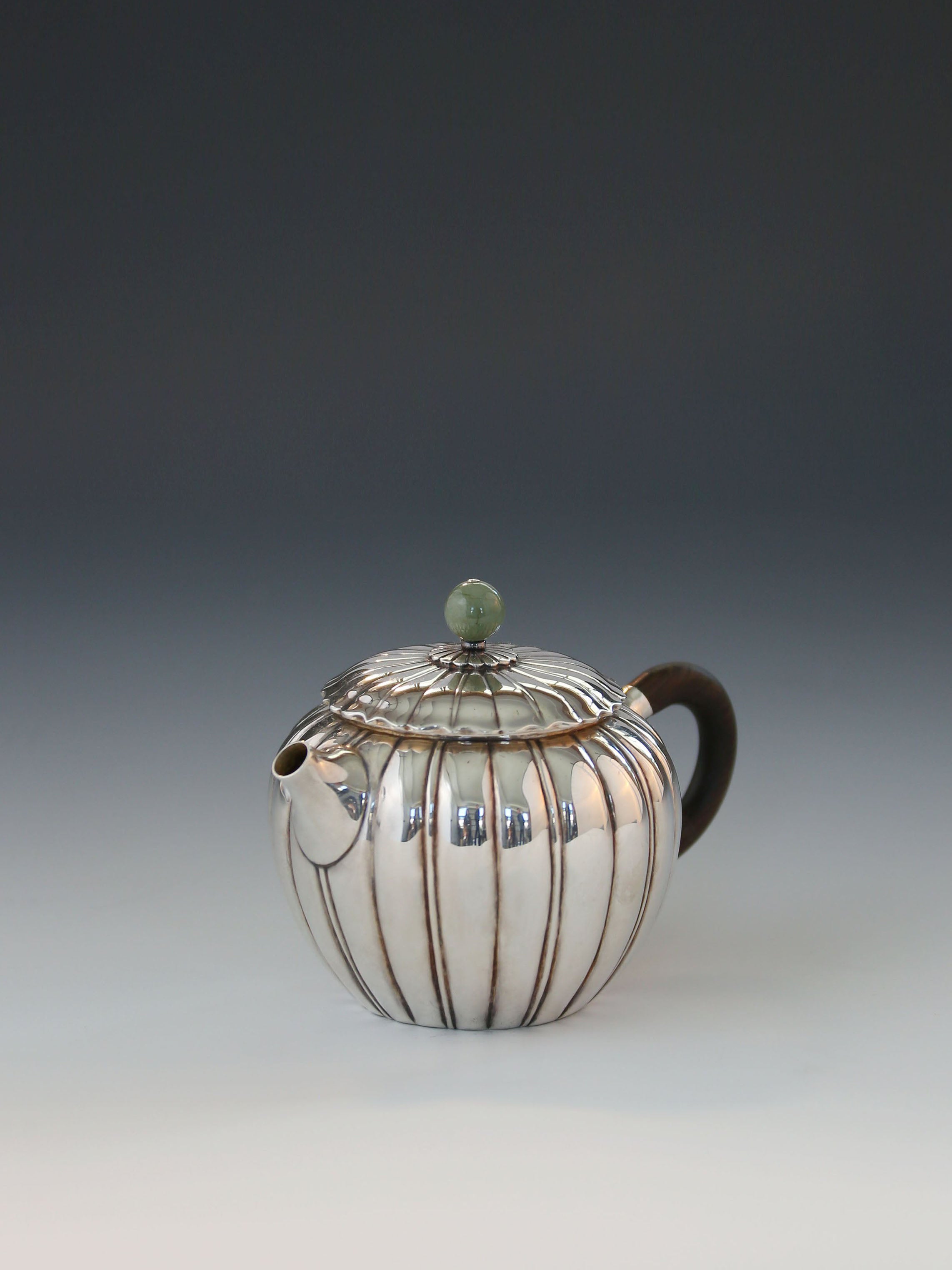 Jade-patterned sterling silver teapot