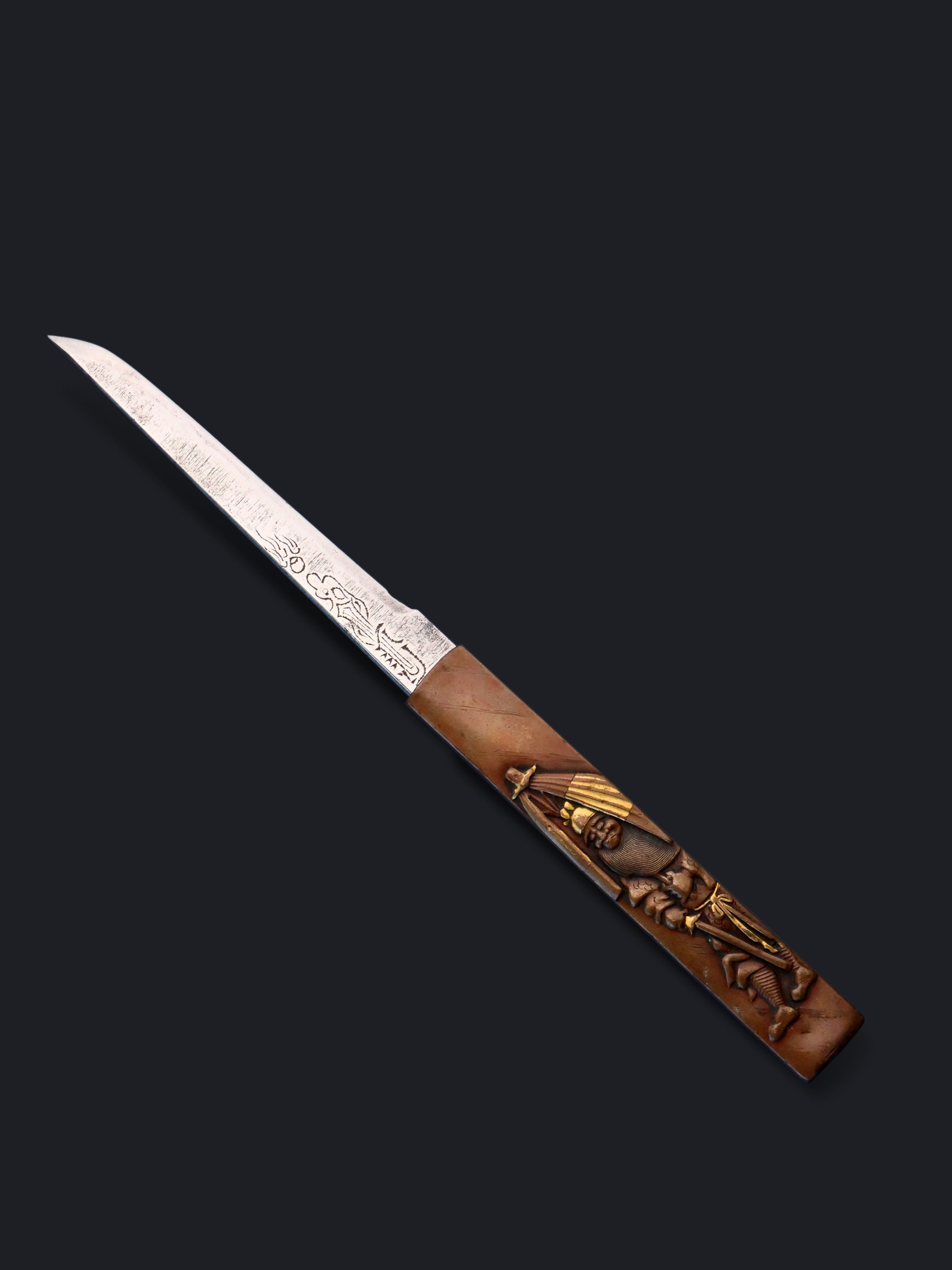 A small knife depicting Zhong Kui from the Edo period in Japan.