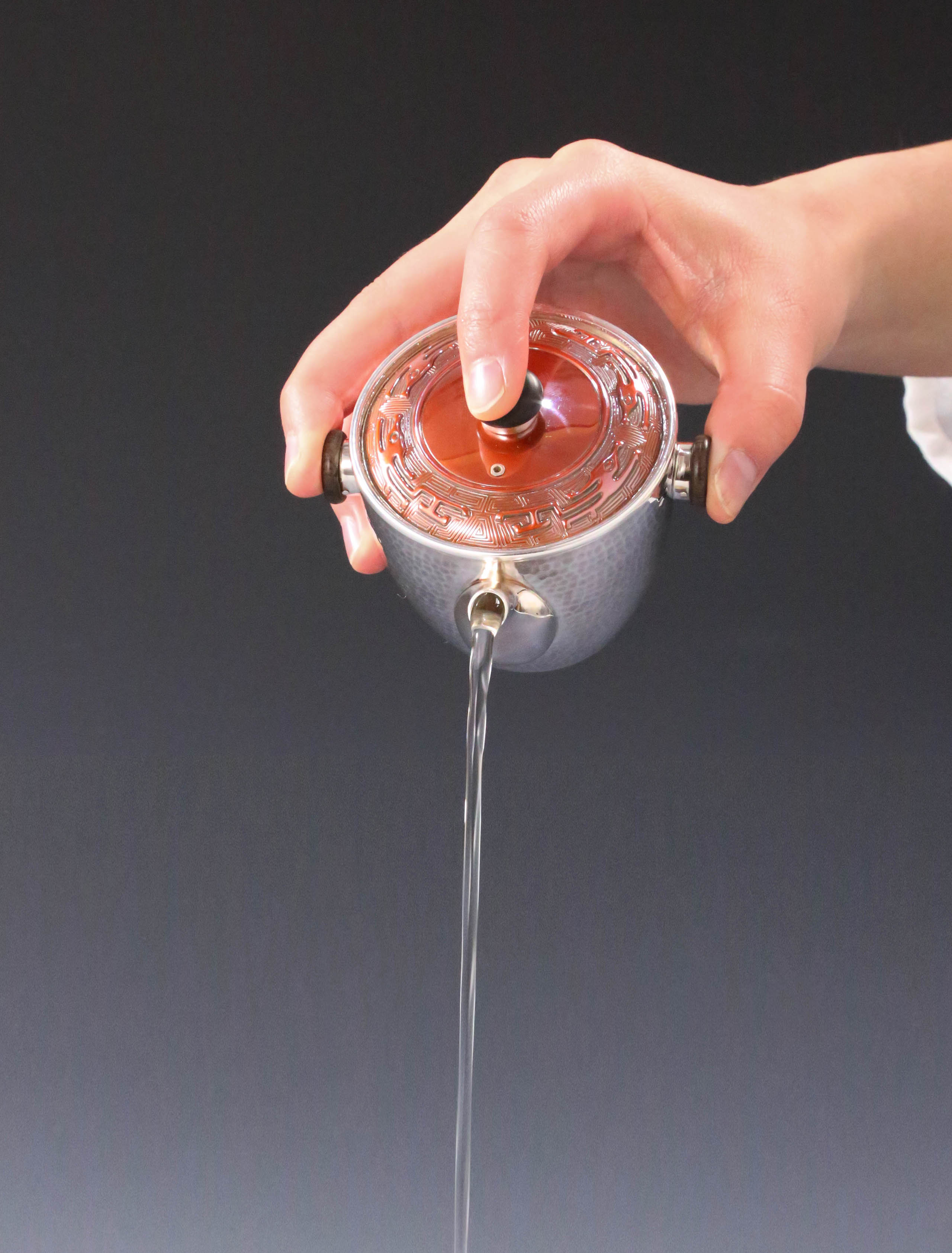 Vermilion-covered silver teapot