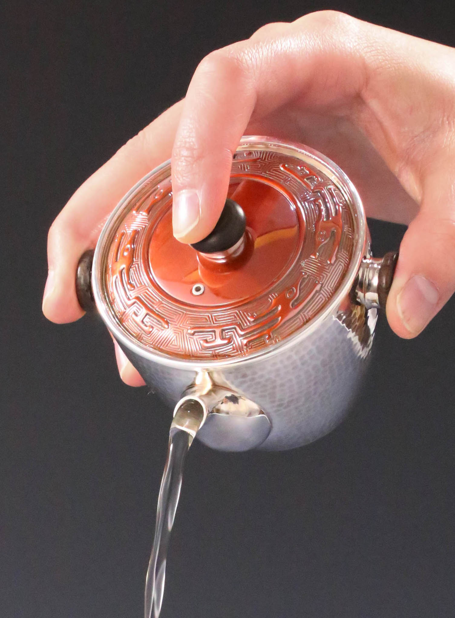 Vermilion-covered silver teapot