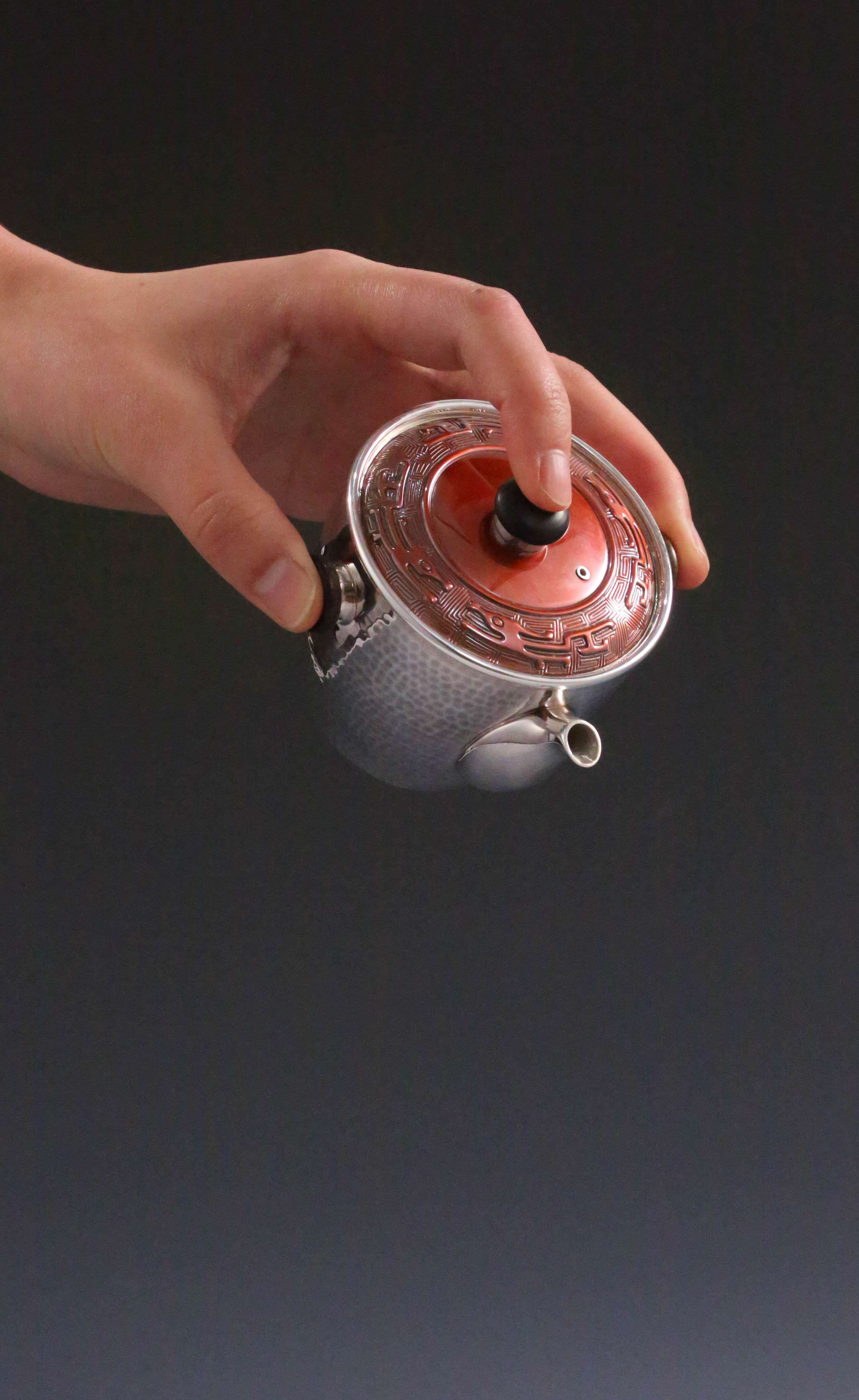 Vermilion-covered silver teapot