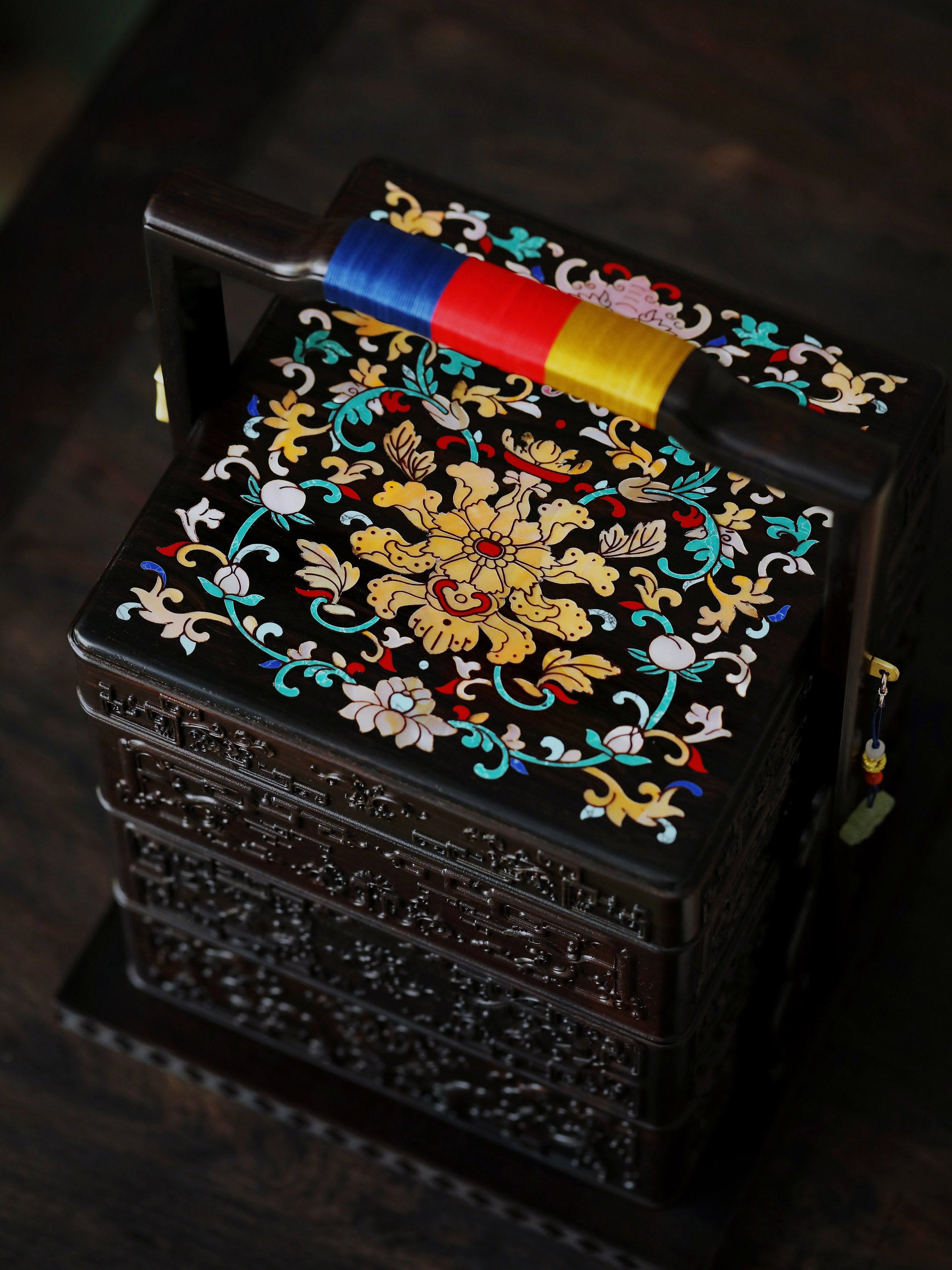 Purple sandalwood inlaid mother-of-pearl square carrying box with auspicious motifs of longevity and good fortune