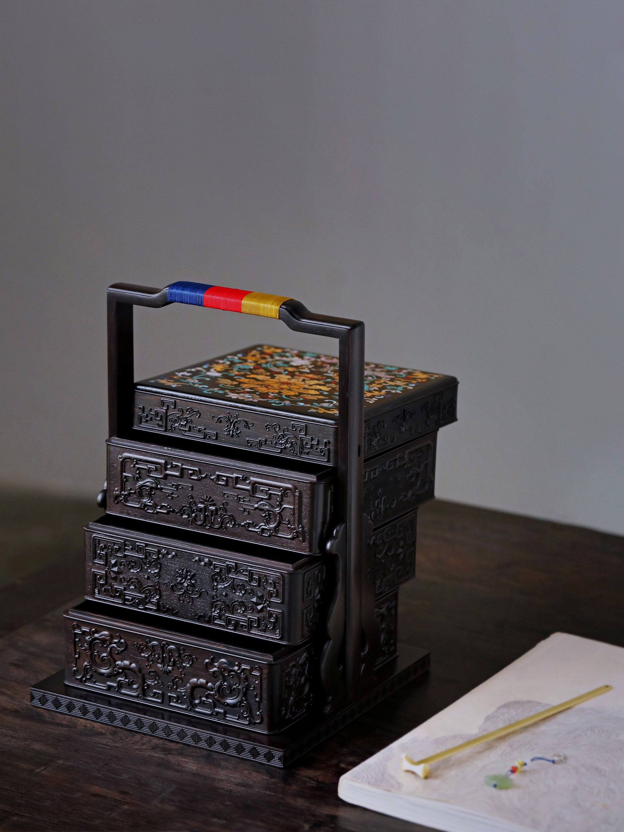 Purple sandalwood inlaid mother-of-pearl square carrying box with auspicious motifs of longevity and good fortune