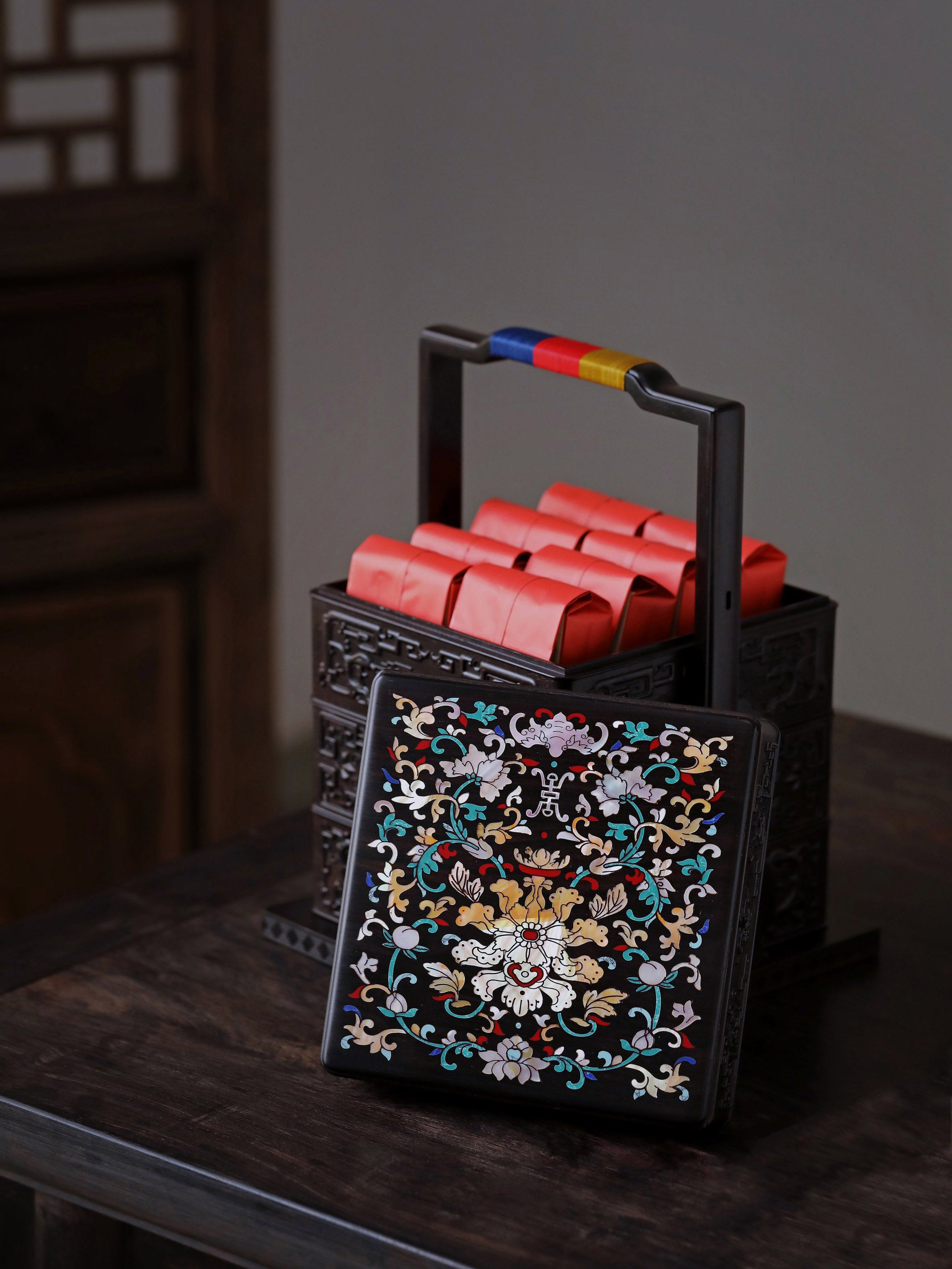 Purple sandalwood inlaid mother-of-pearl square carrying box with auspicious motifs of longevity and good fortune