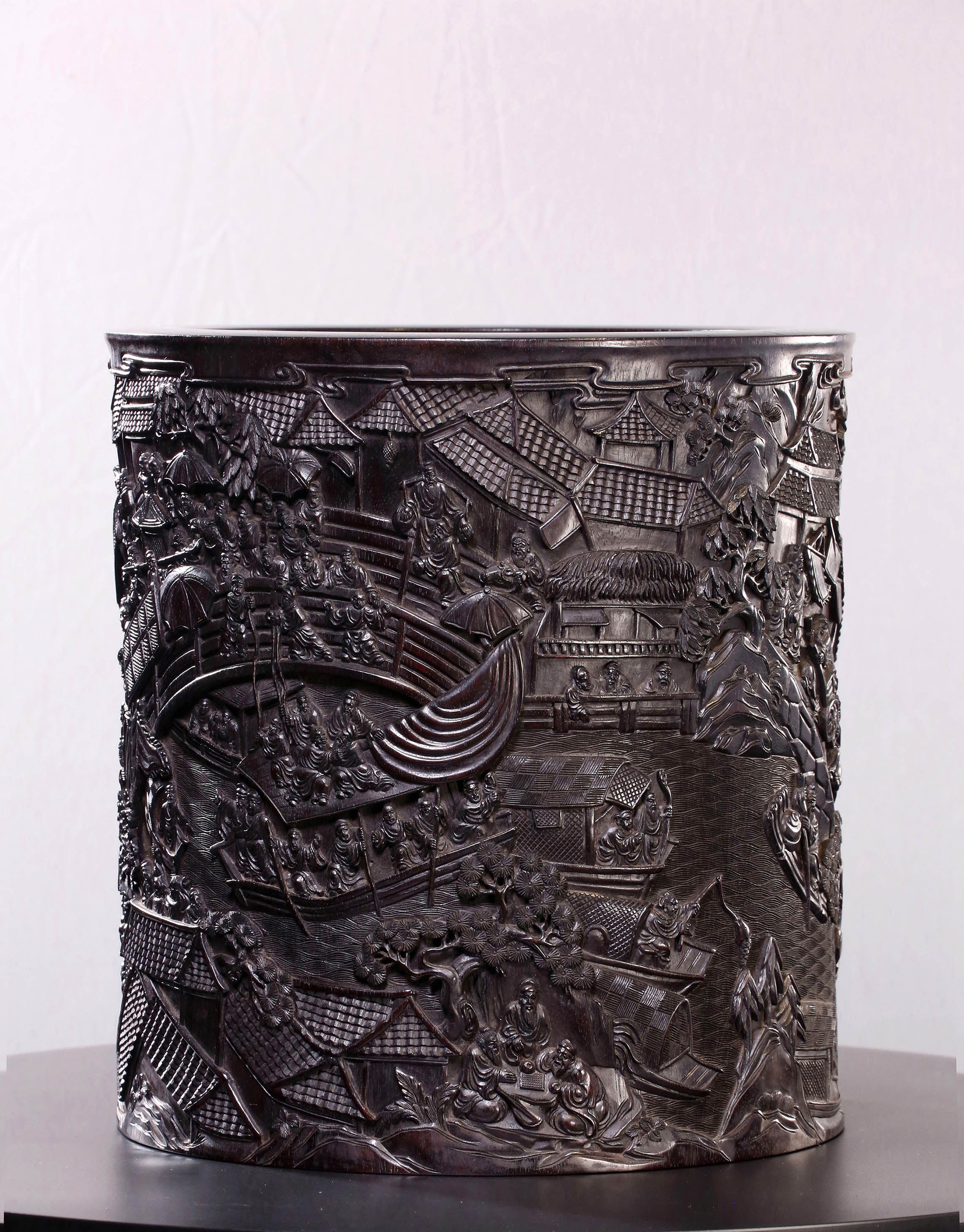 Indian rosewood brush holder depicting the Qingming Scroll