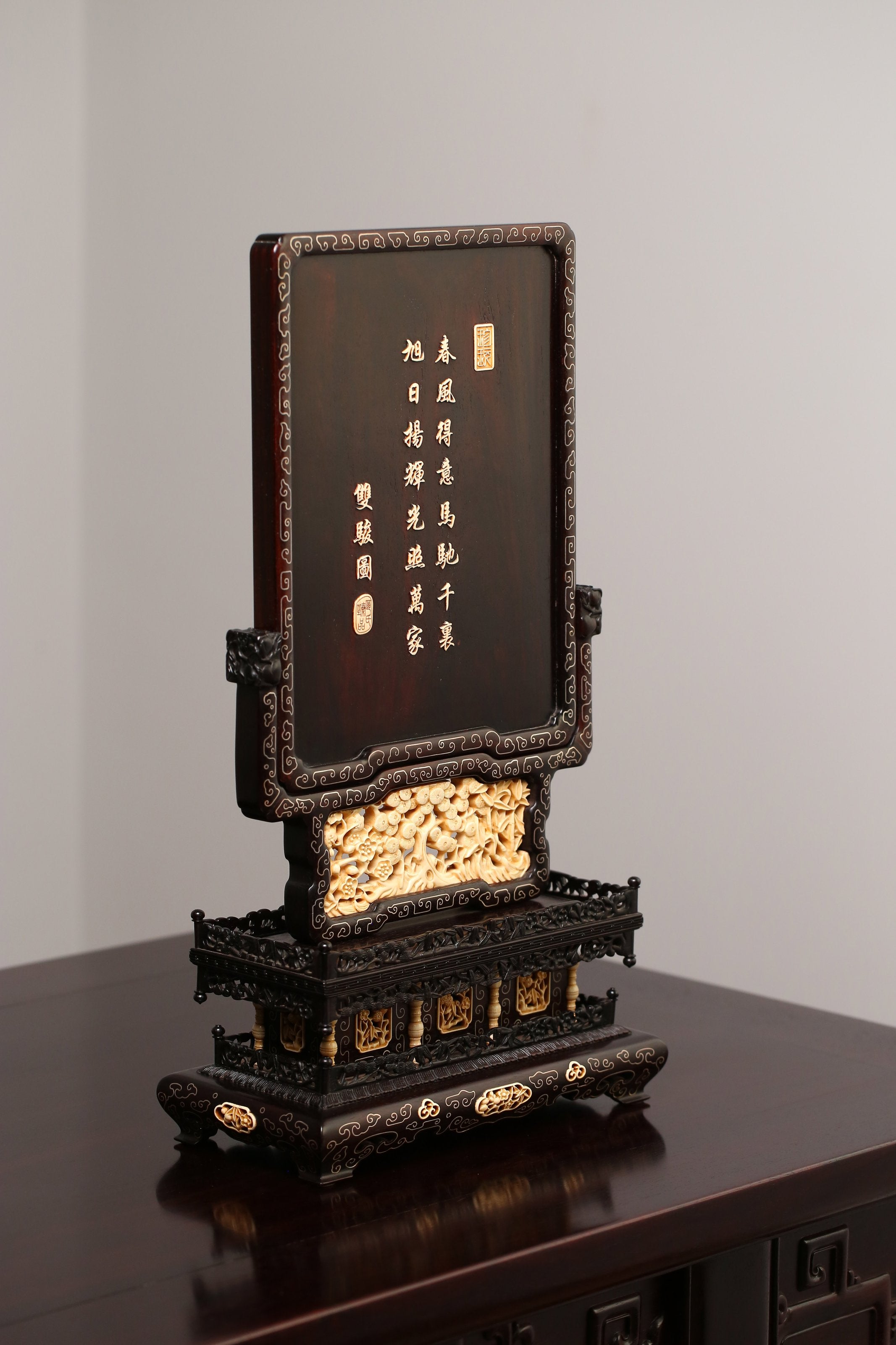 Rosewood screen inlaid with precious stones and mammoth ivory