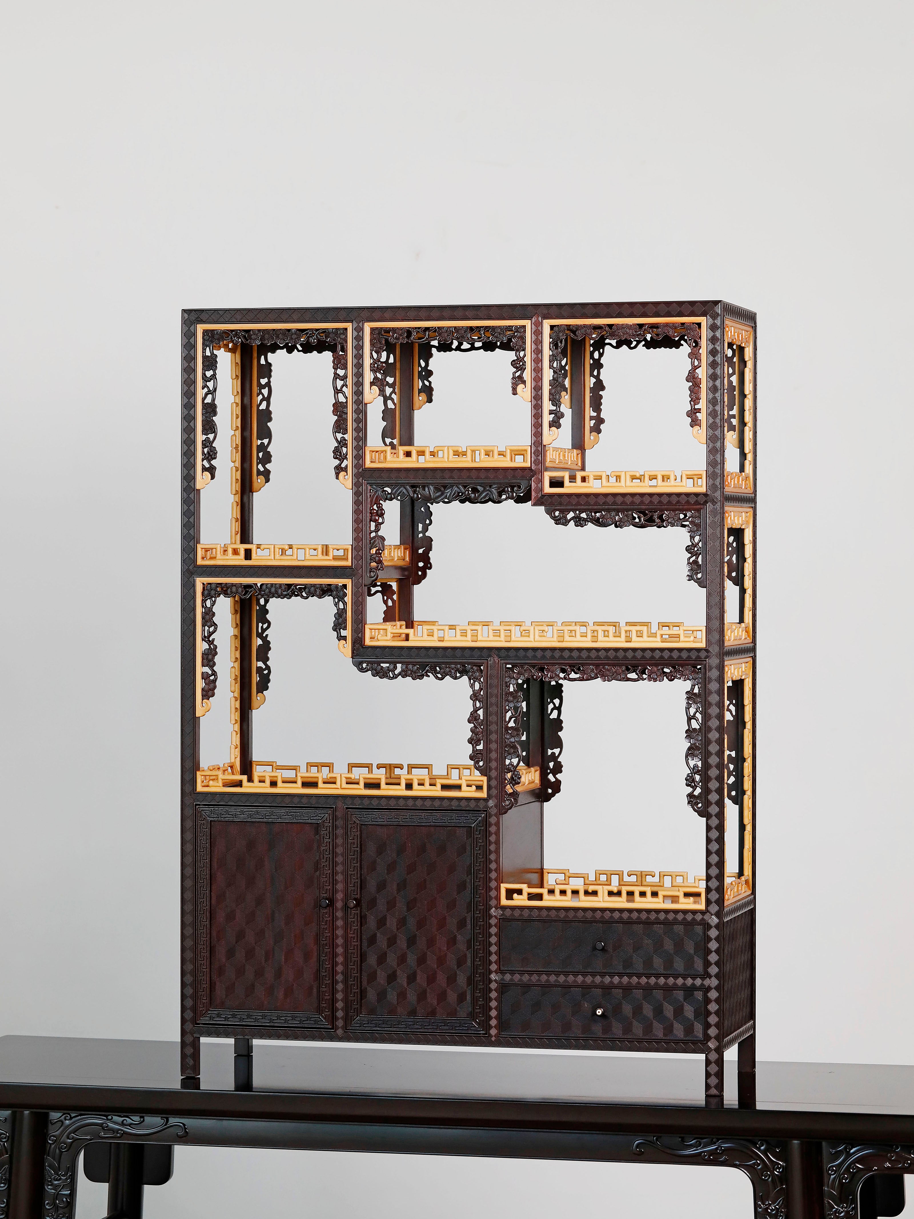 A small-leaf rosewood table inlaid with boxwood brocade pattern, display shelf