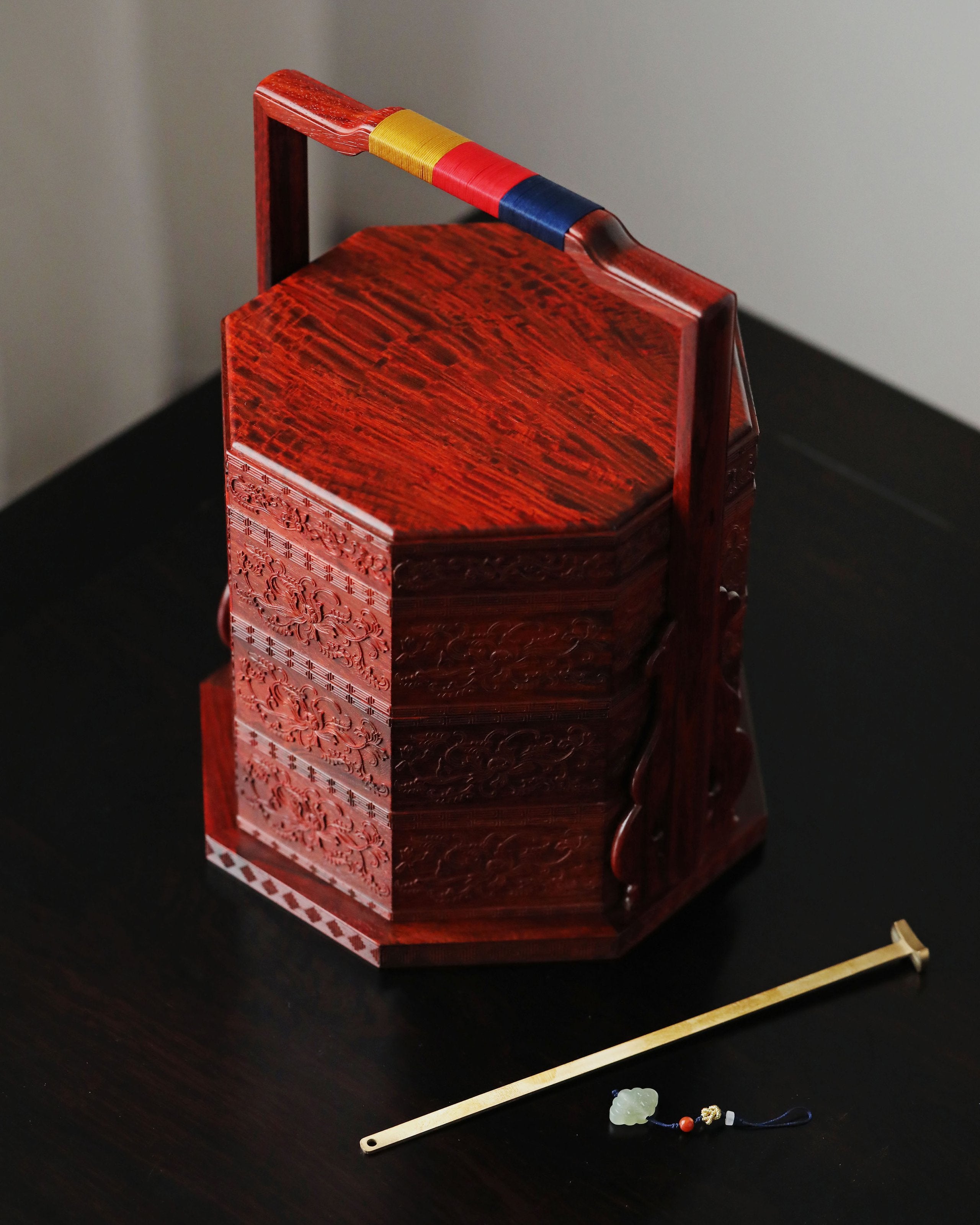 Small-leaf sandalwood carved octagonal box with passionflower design