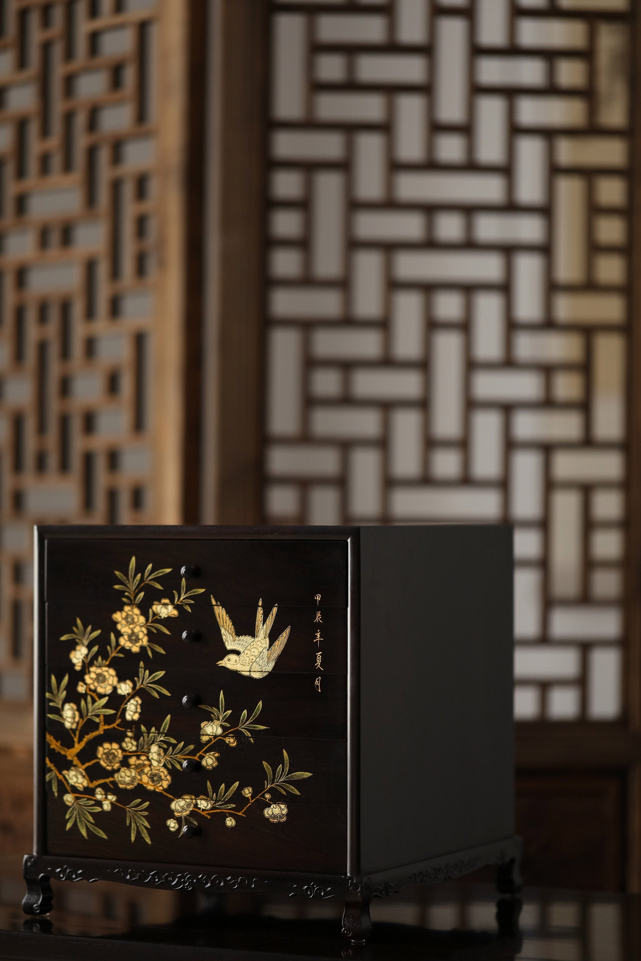 Gold piled high, joy on eyebrows / Wealth and good fortune on the table, five cups of tea on the sideboard