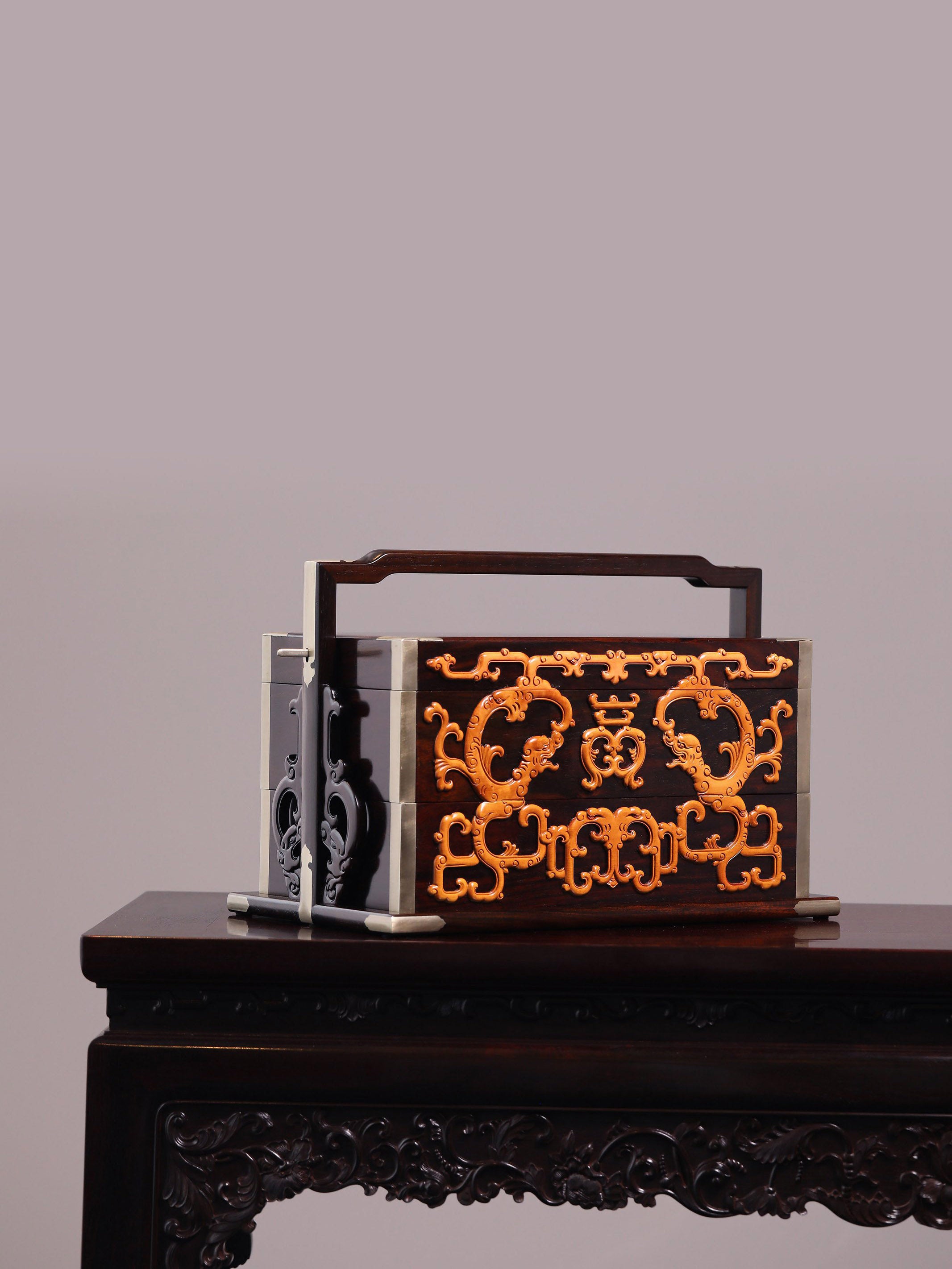 Double-layered box made of rosewood inlaid with boxwood dragons and longevity symbols