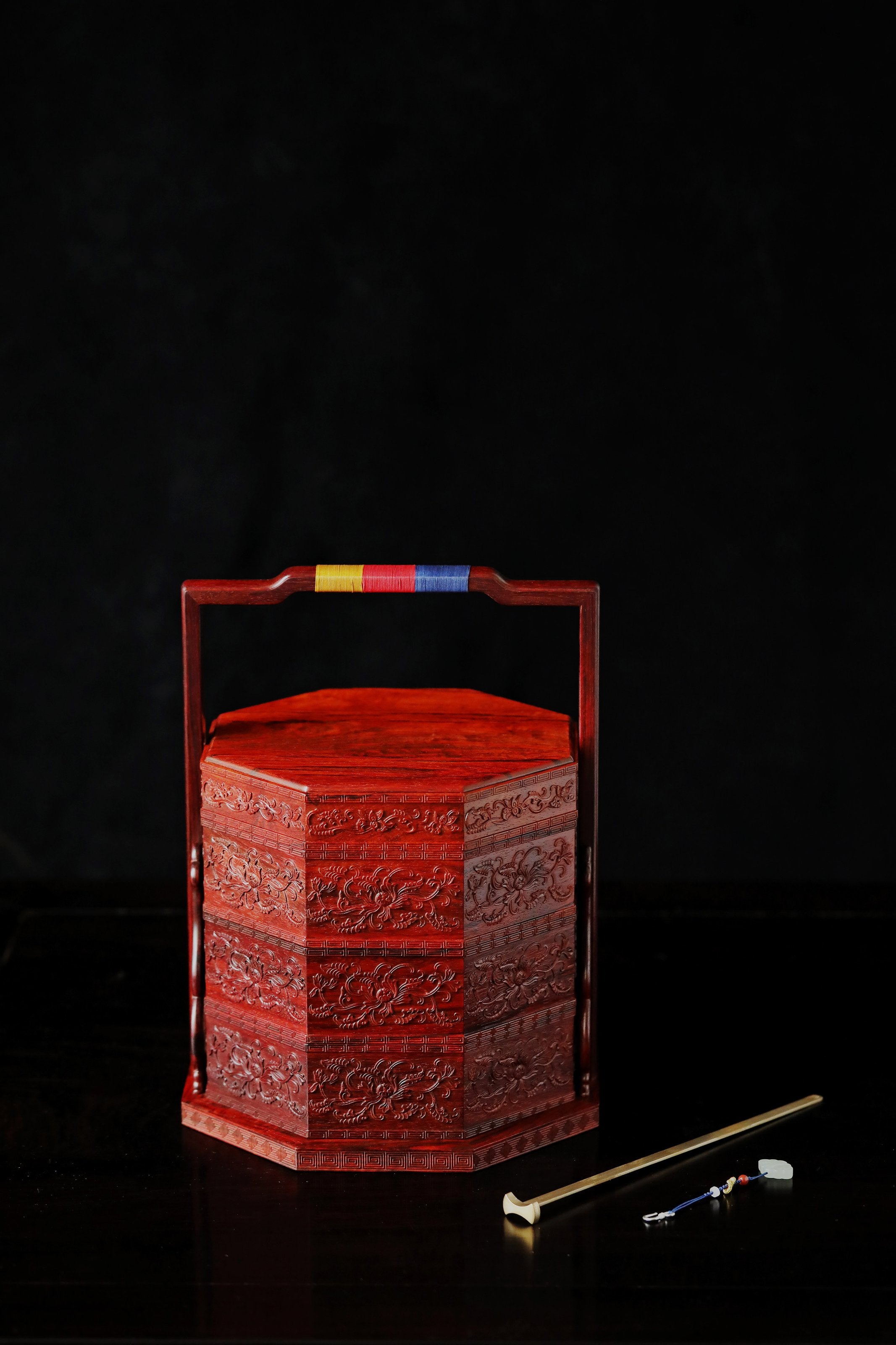 Small-leaf sandalwood carved octagonal box with passionflower design