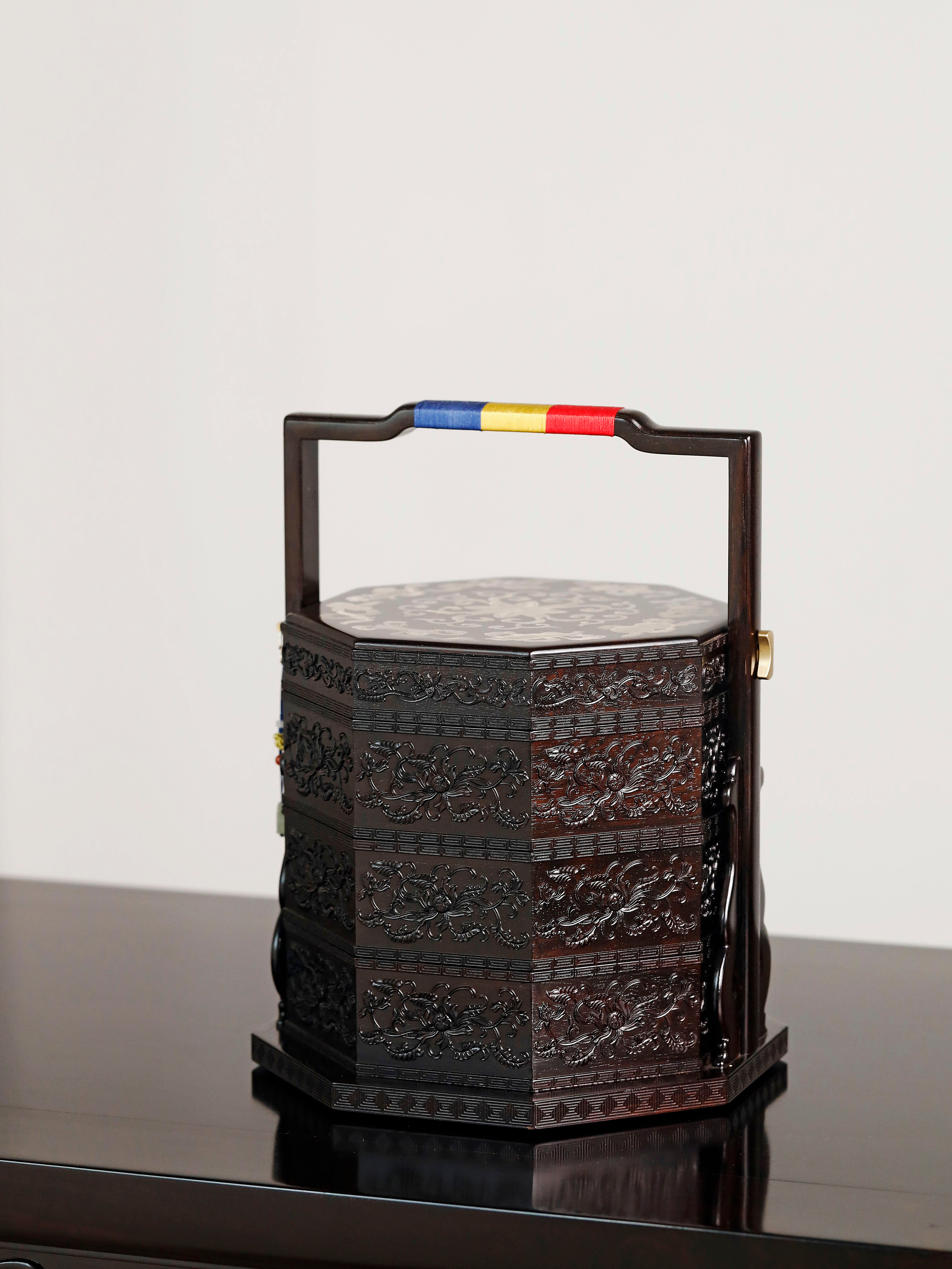 Purple sandalwood inlaid mother-of-pearl octagonal box with eight treasures