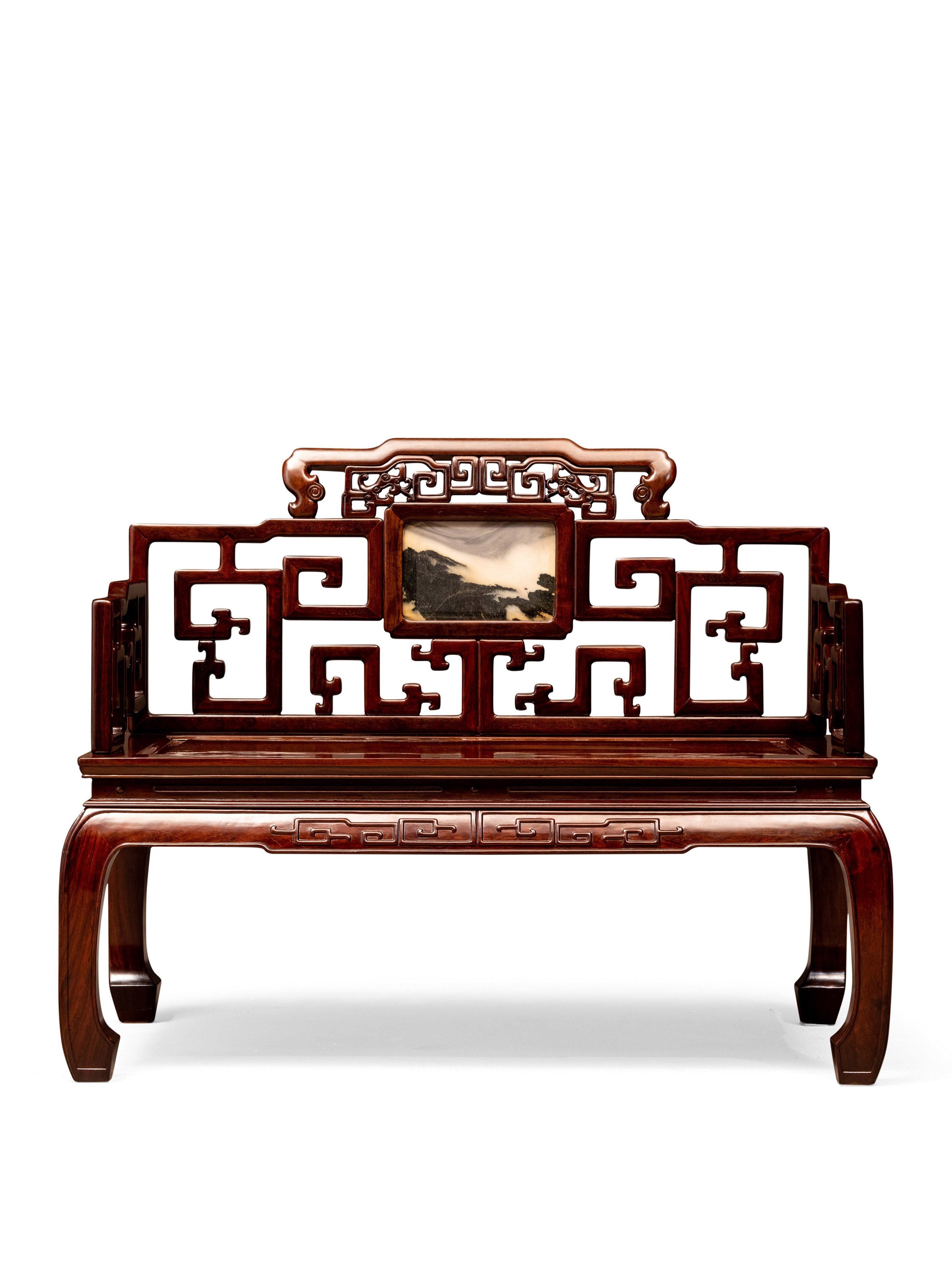 Ebony and marble inlaid backrest, high waist, bulging legs, and convex teeth throne