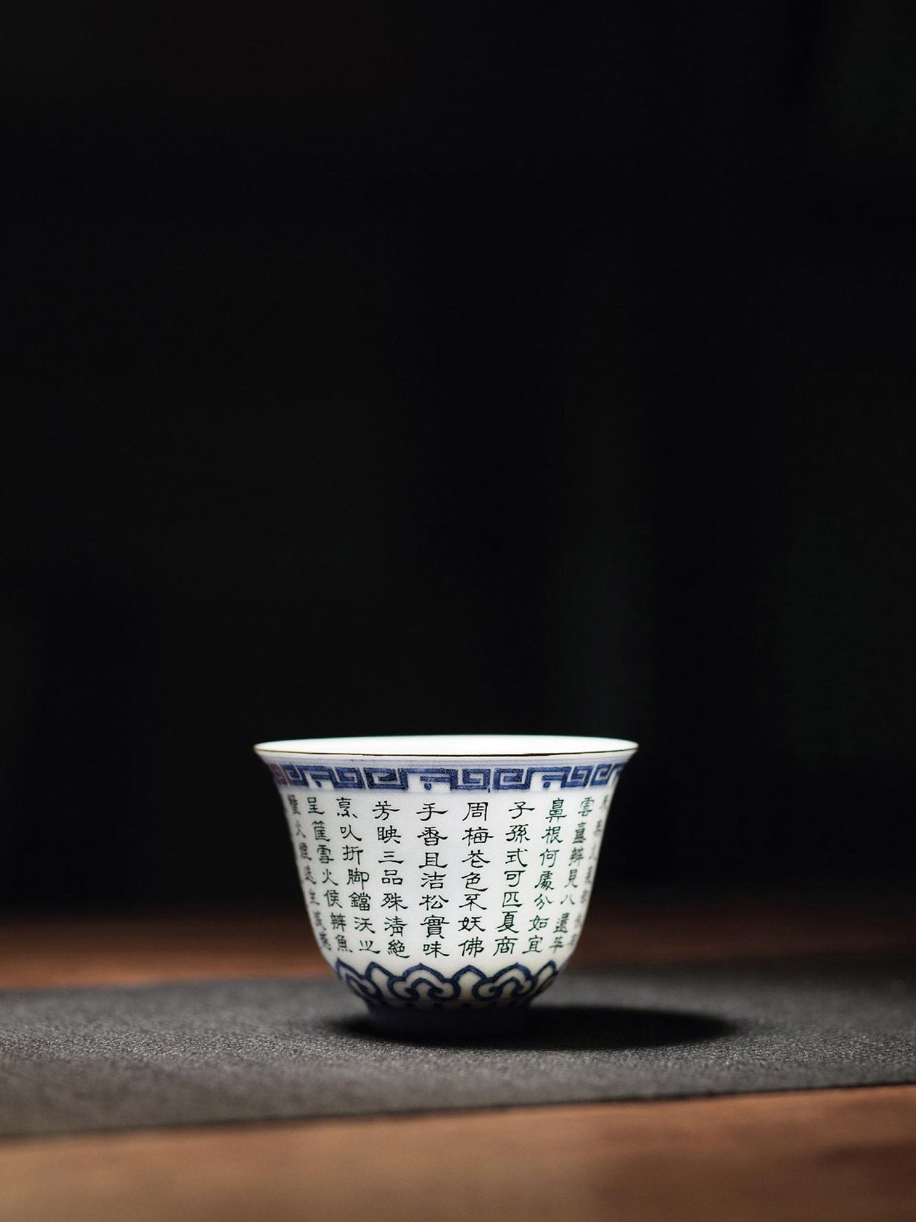 Blue and white porcelain cup with the character "寿" (longevity) / Blue and white porcelain cup with poems