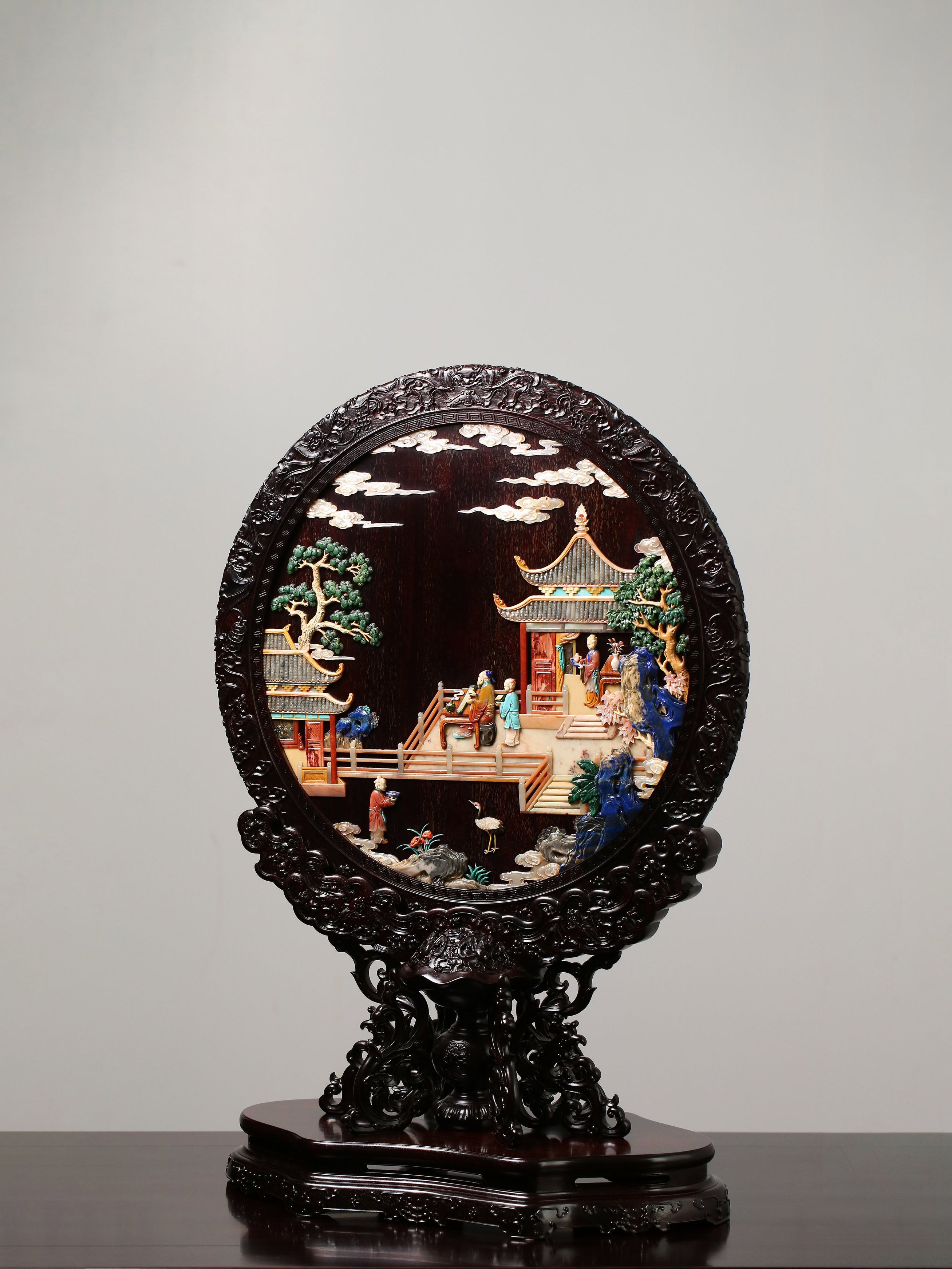 A Zitan Screen Inlaid with Treasures and Featuring a High-Ranking Official