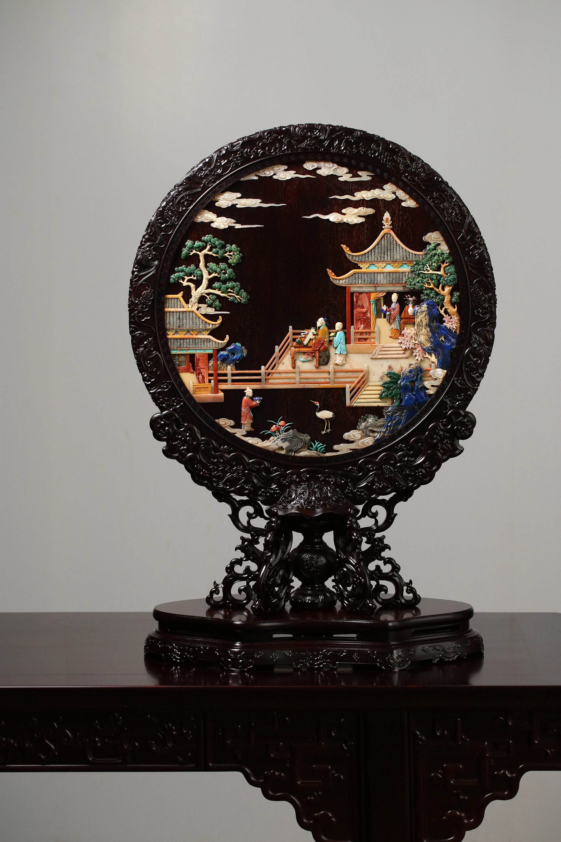 A Zitan Screen Inlaid with Treasures and Featuring a High-Ranking Official