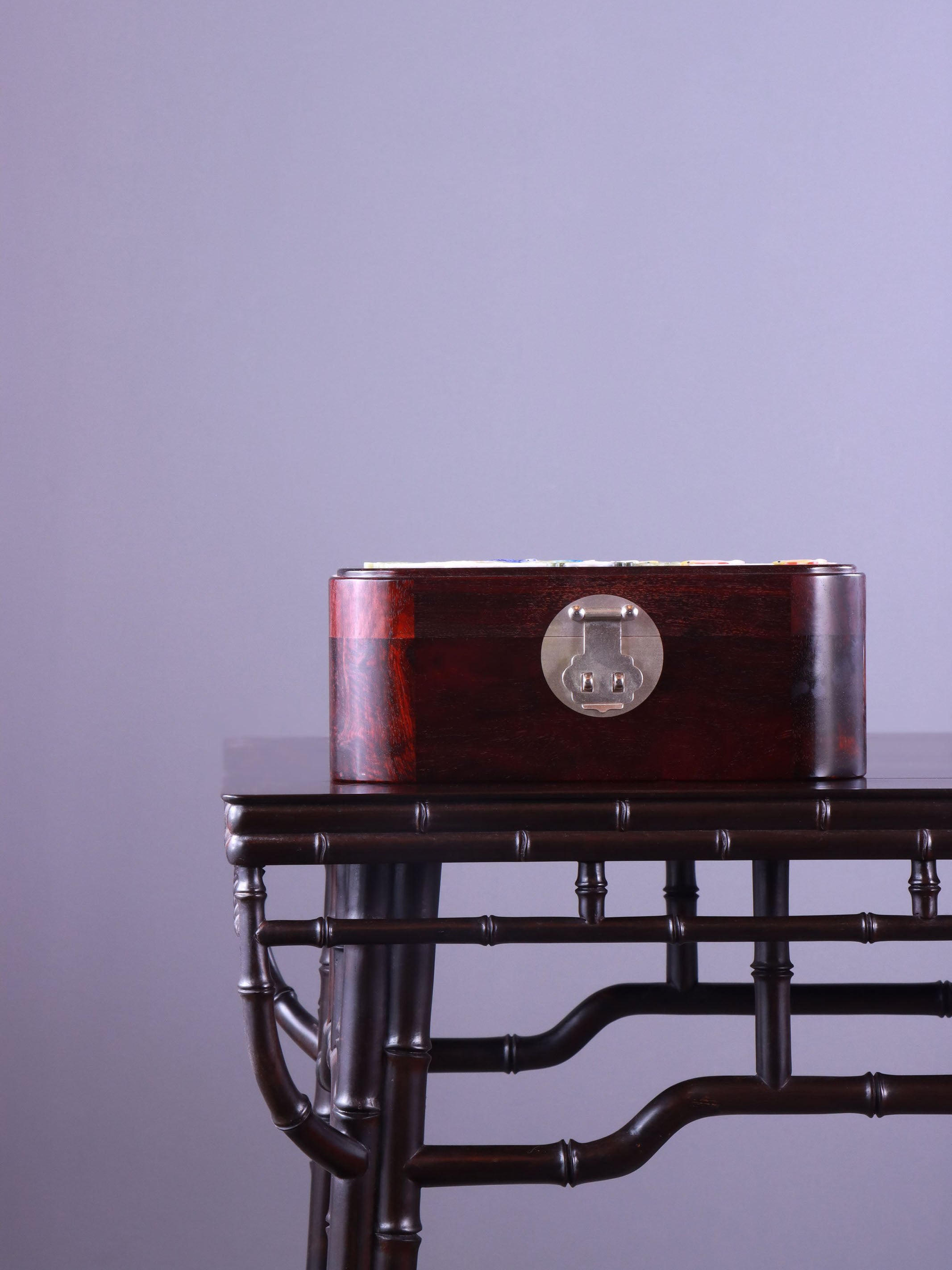 White Lotus Leaning on Kingfisher Tea Box