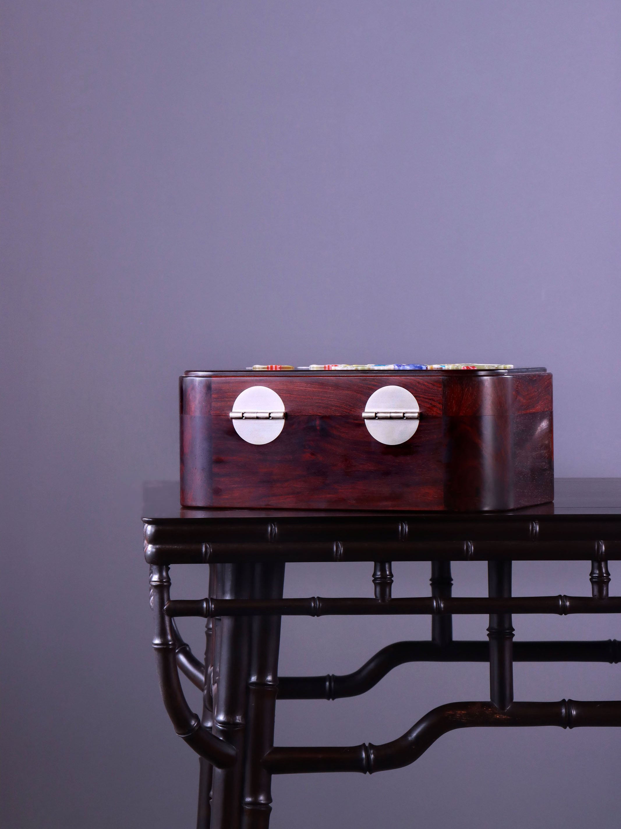 White Lotus Leaning on Kingfisher Tea Box