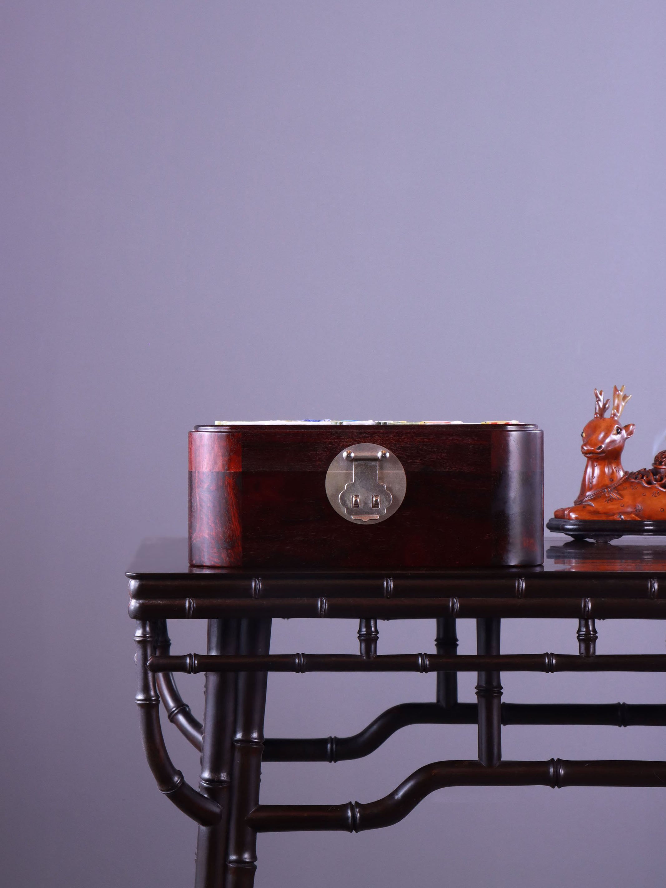 White Lotus Leaning on Kingfisher Tea Box