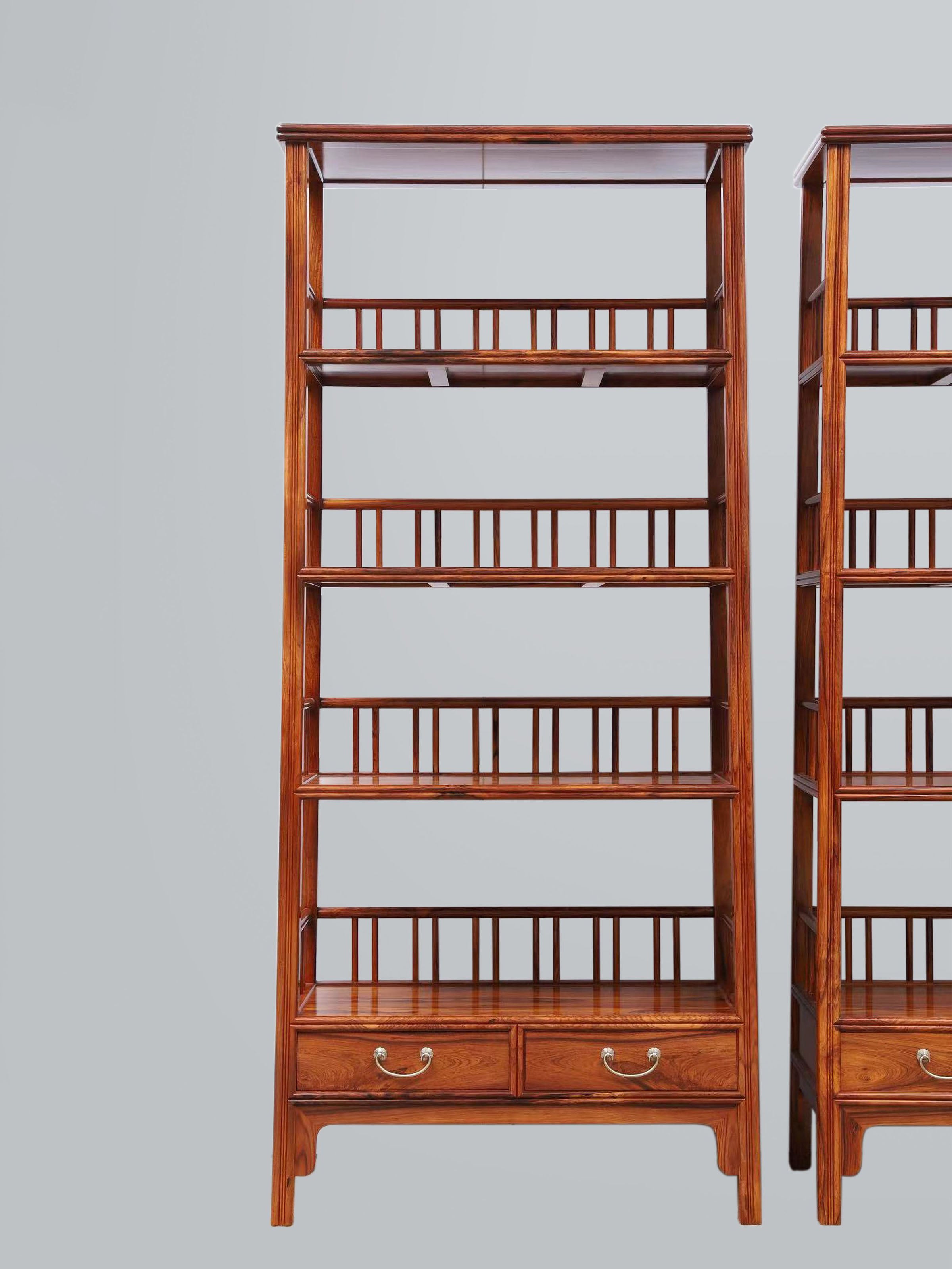 White rosewood branches sparsely sprout from the bottom of the scholar's desk.