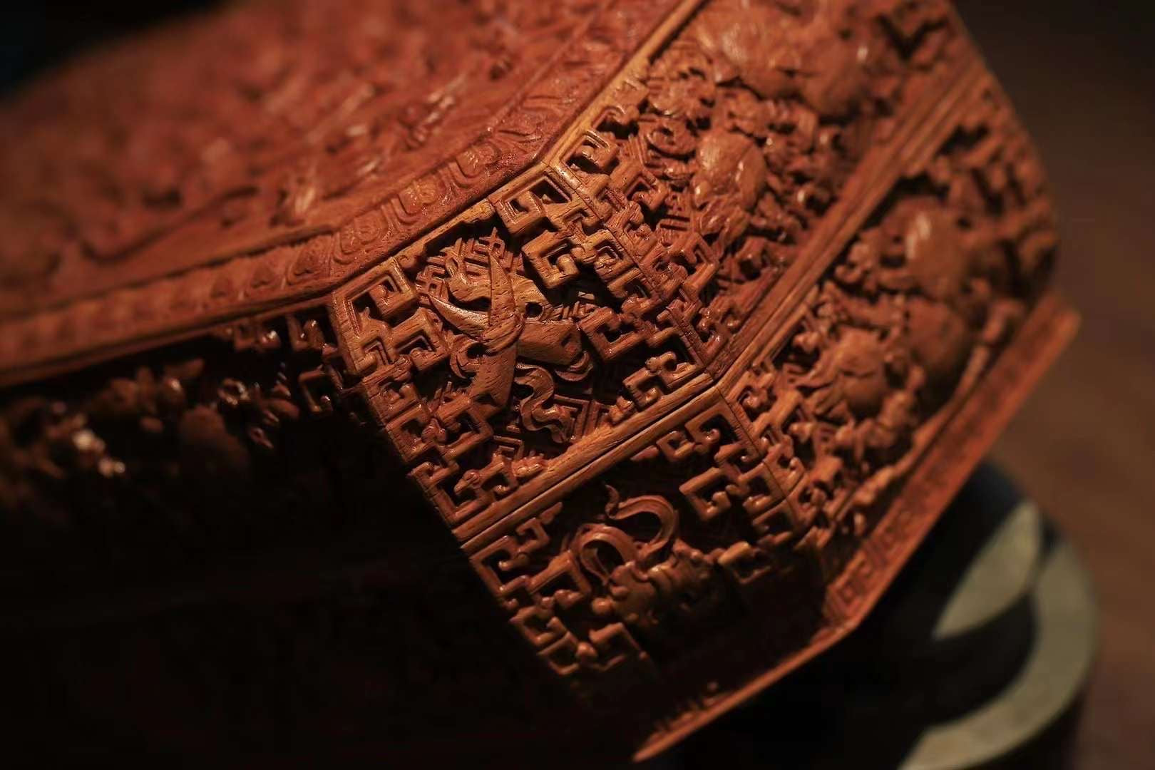 Tea box with full carving of lychee, butterfly, and dragon patterns