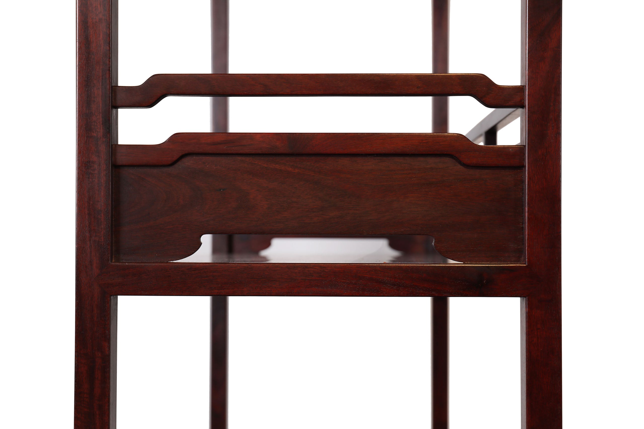 Three-tiered railing with drawers and large shelving
