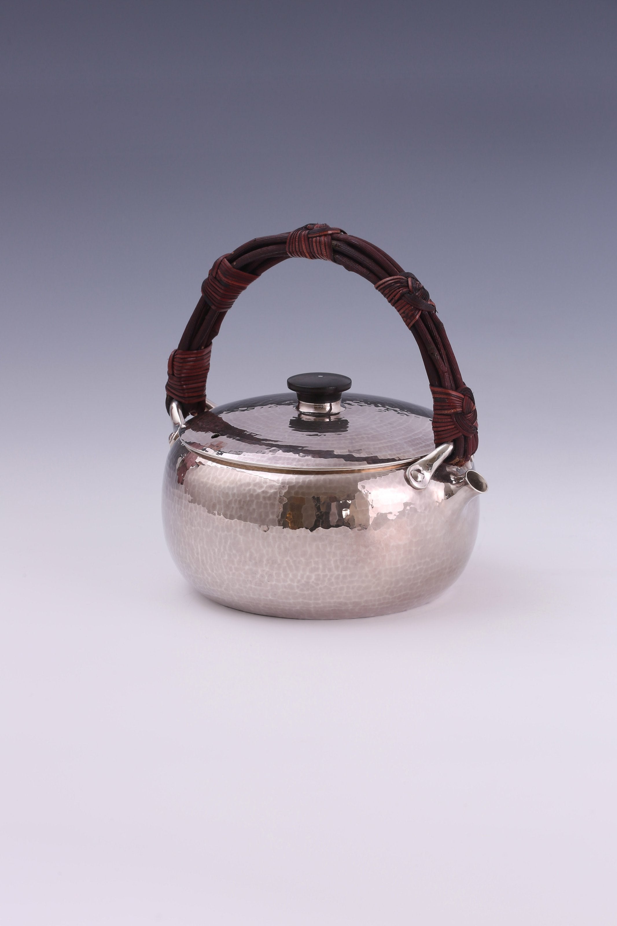 Large rattan spout, silver kettle, cast iron tea stove