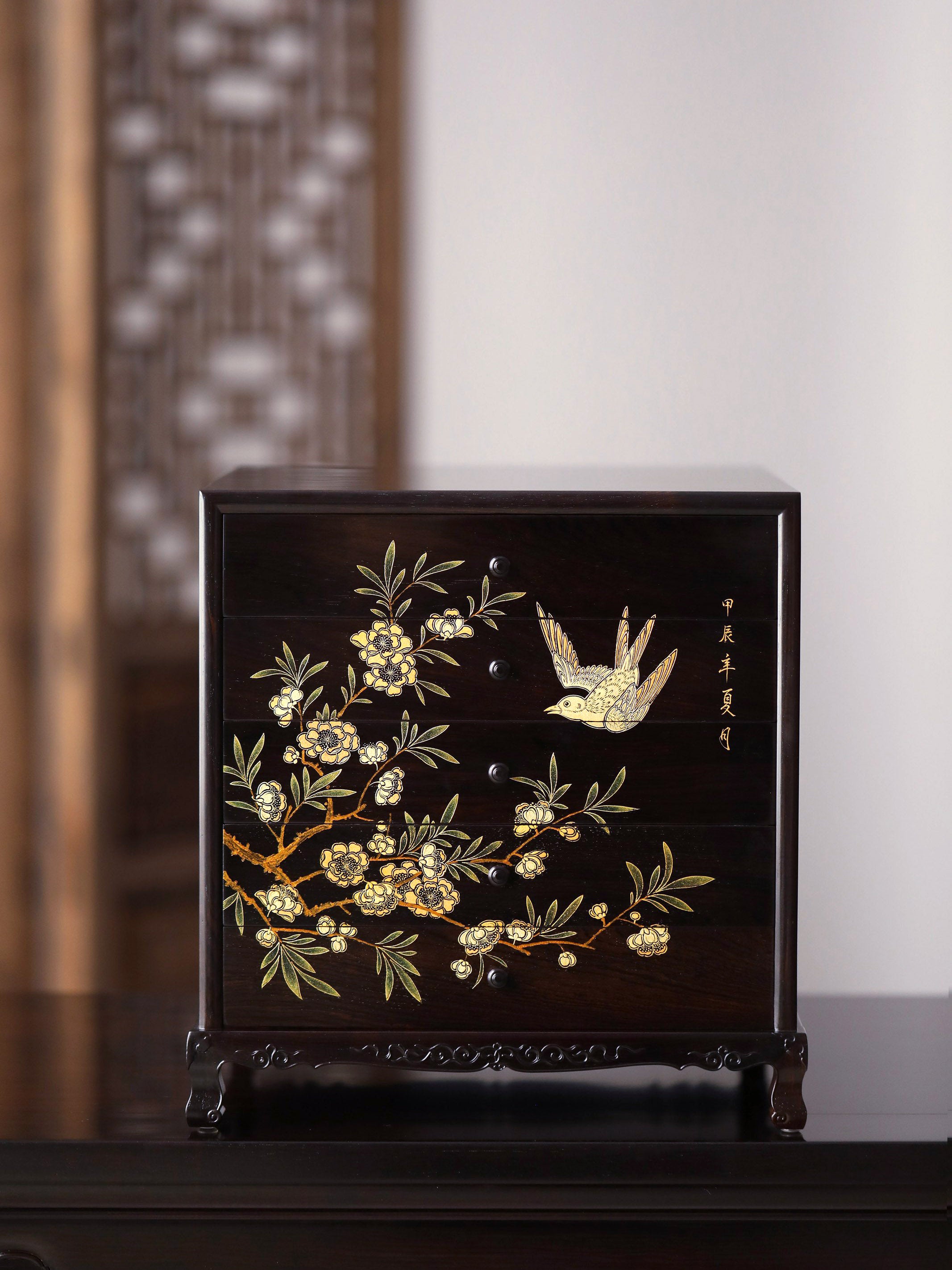 Gold piled high, joy on eyebrows / Wealth and good fortune on the table, five cups of tea on the sideboard