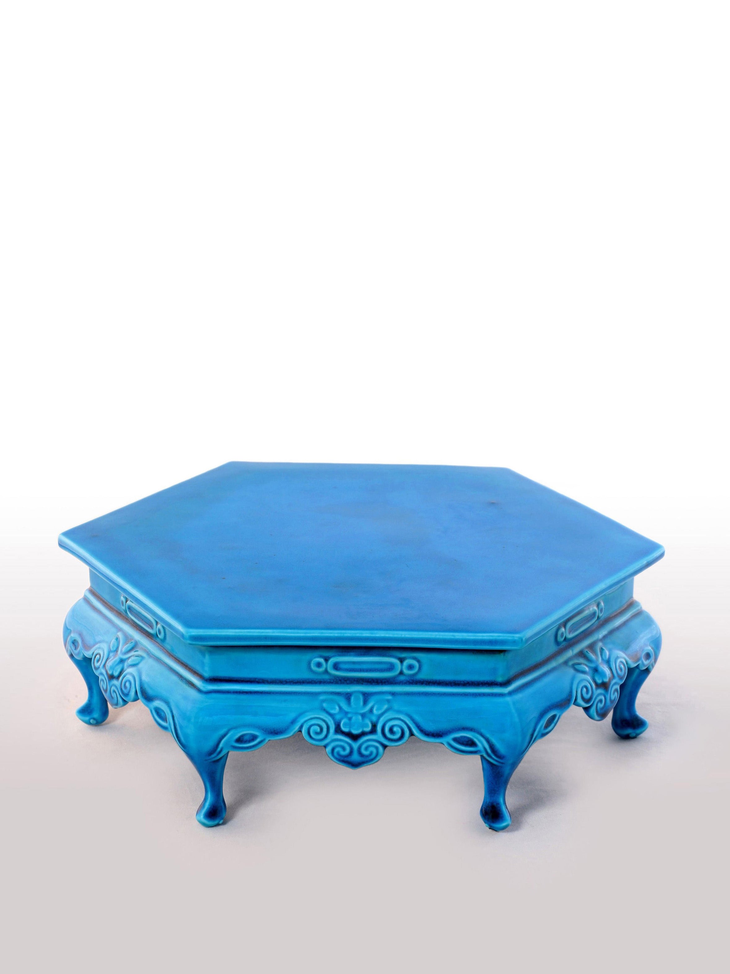 Hexagonal table in peacock blue (Falconite)