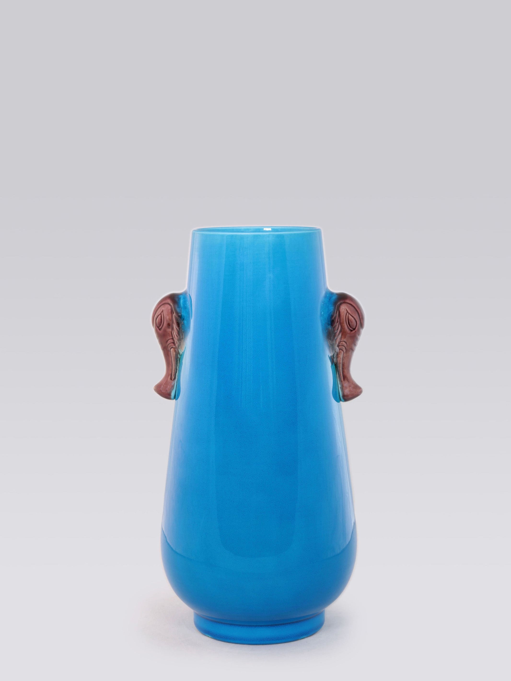 Falconite (peacock blue) elephant trunk bottle
