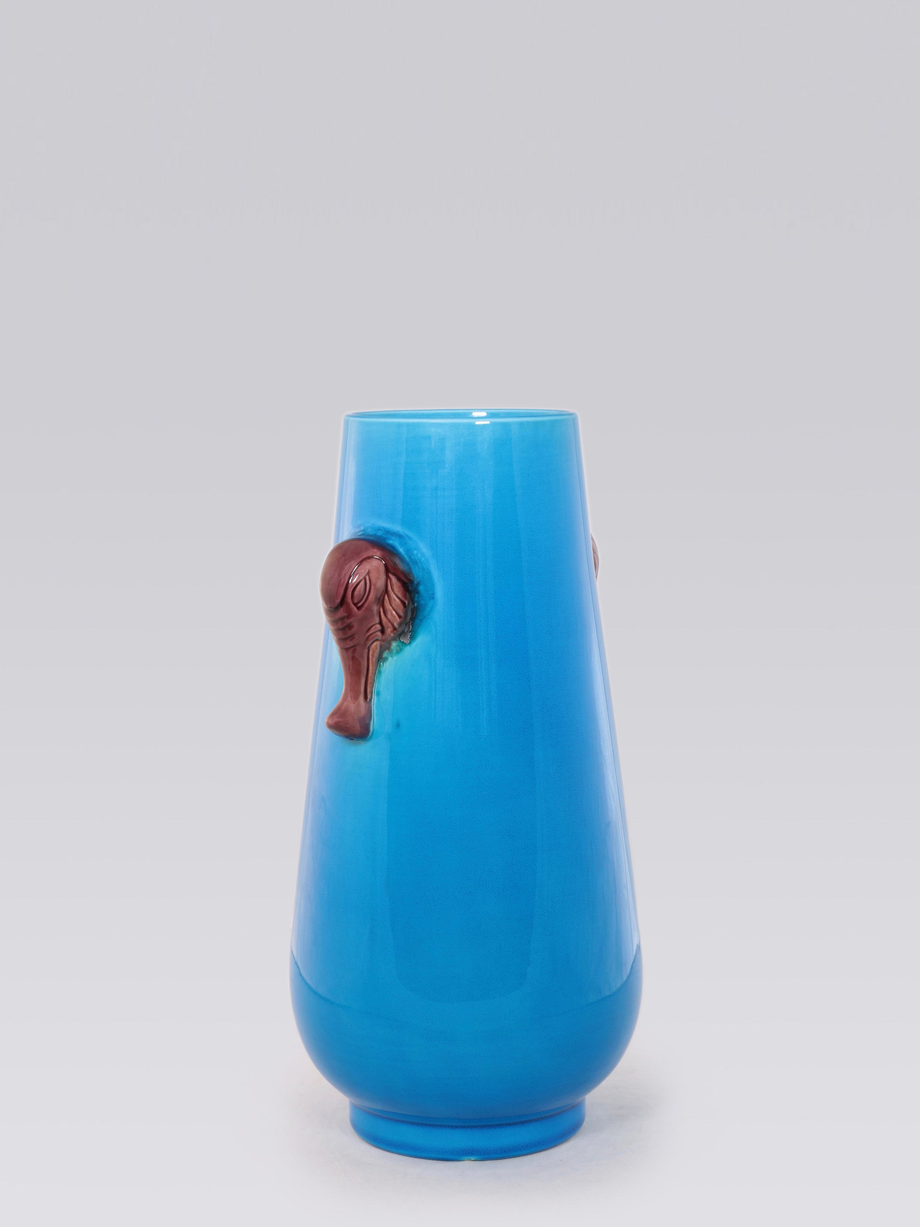 Falconite (peacock blue) elephant trunk bottle