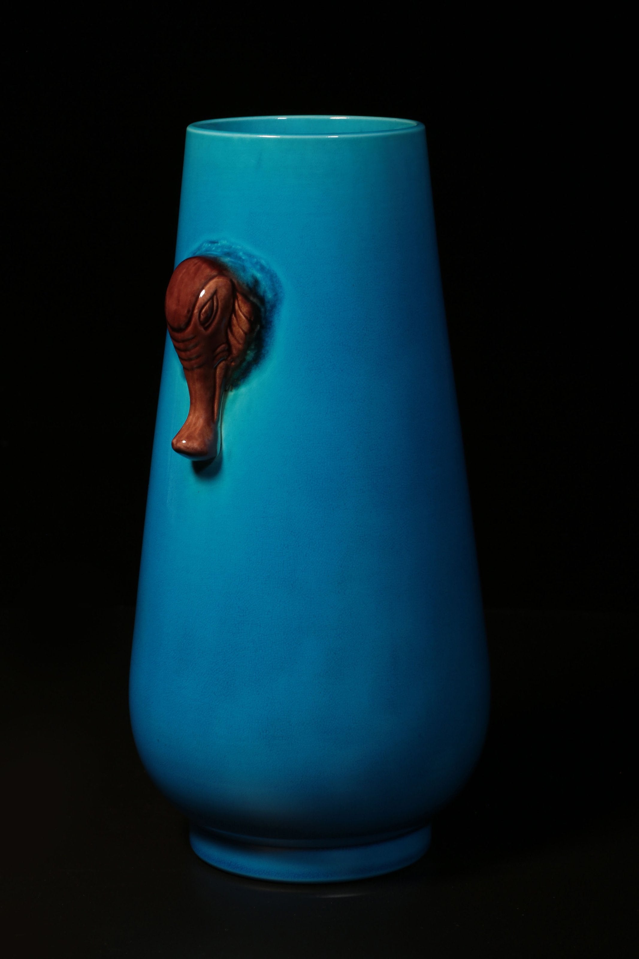 Falconite (peacock blue) elephant trunk bottle
