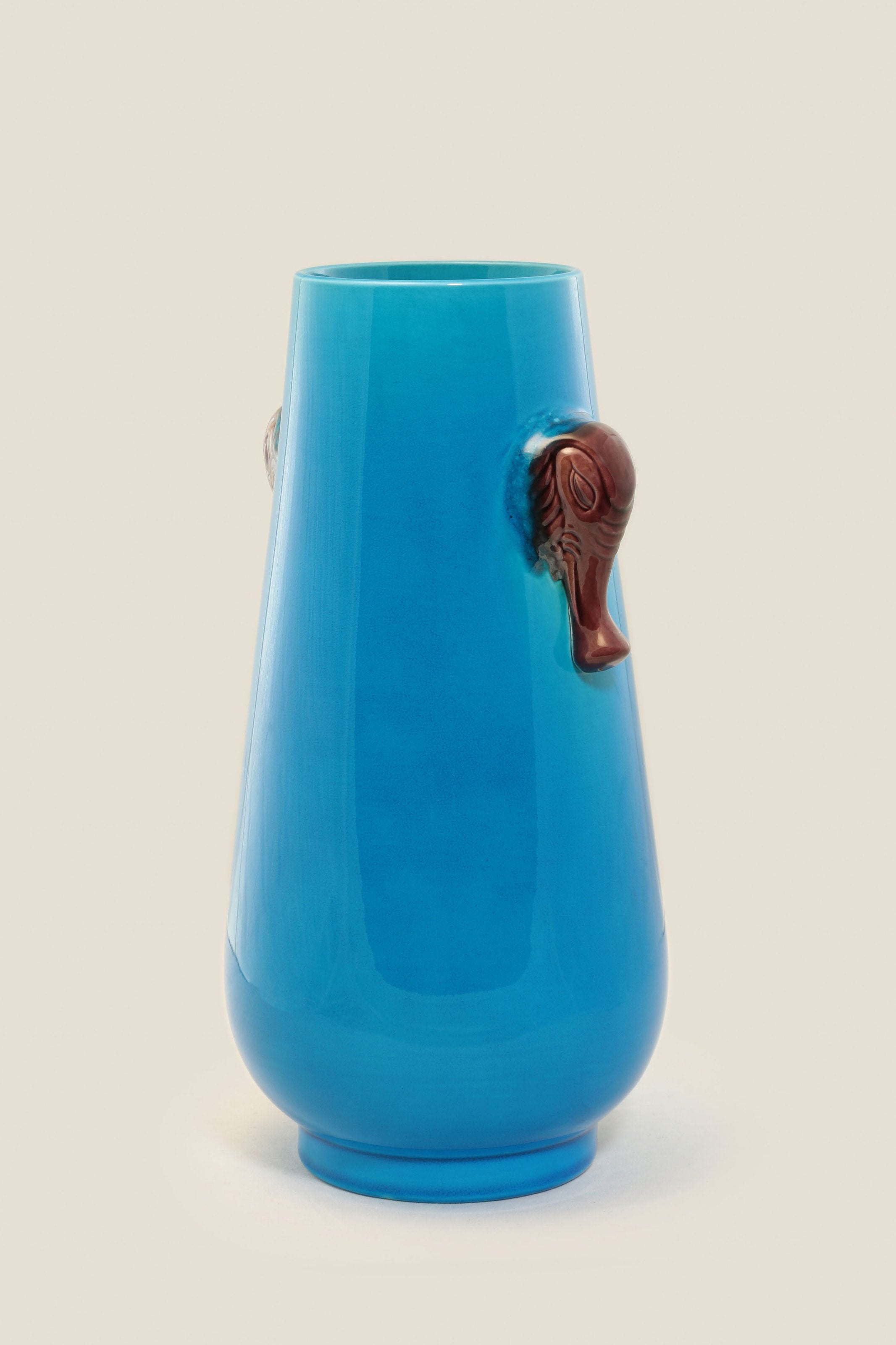 Falconite (peacock blue) elephant trunk bottle