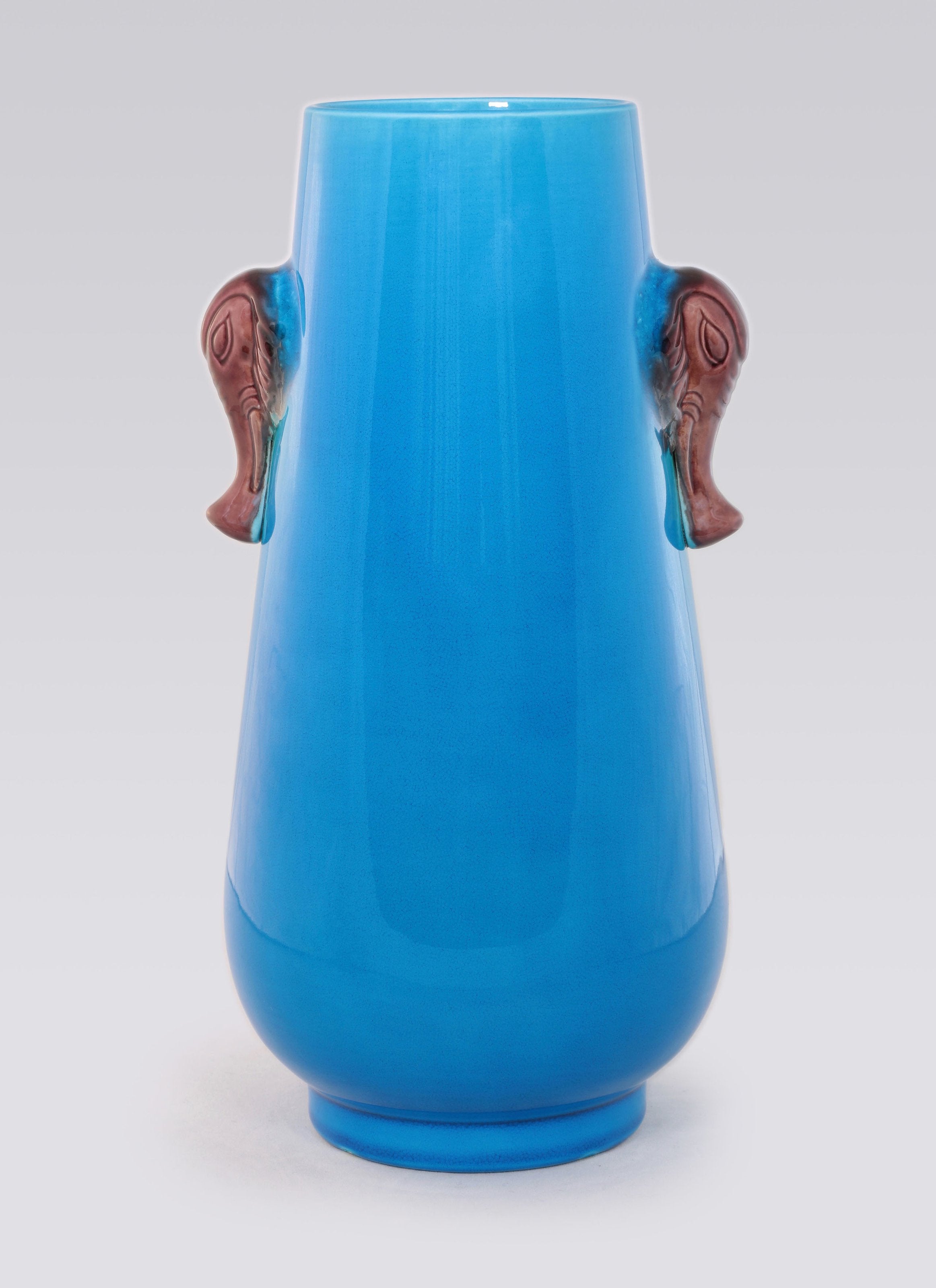 Falconite (peacock blue) elephant trunk bottle
