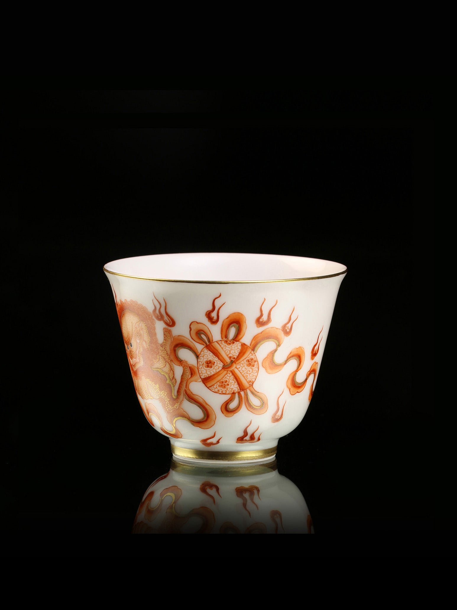 Iron-red and gold-decorated lion dance cup