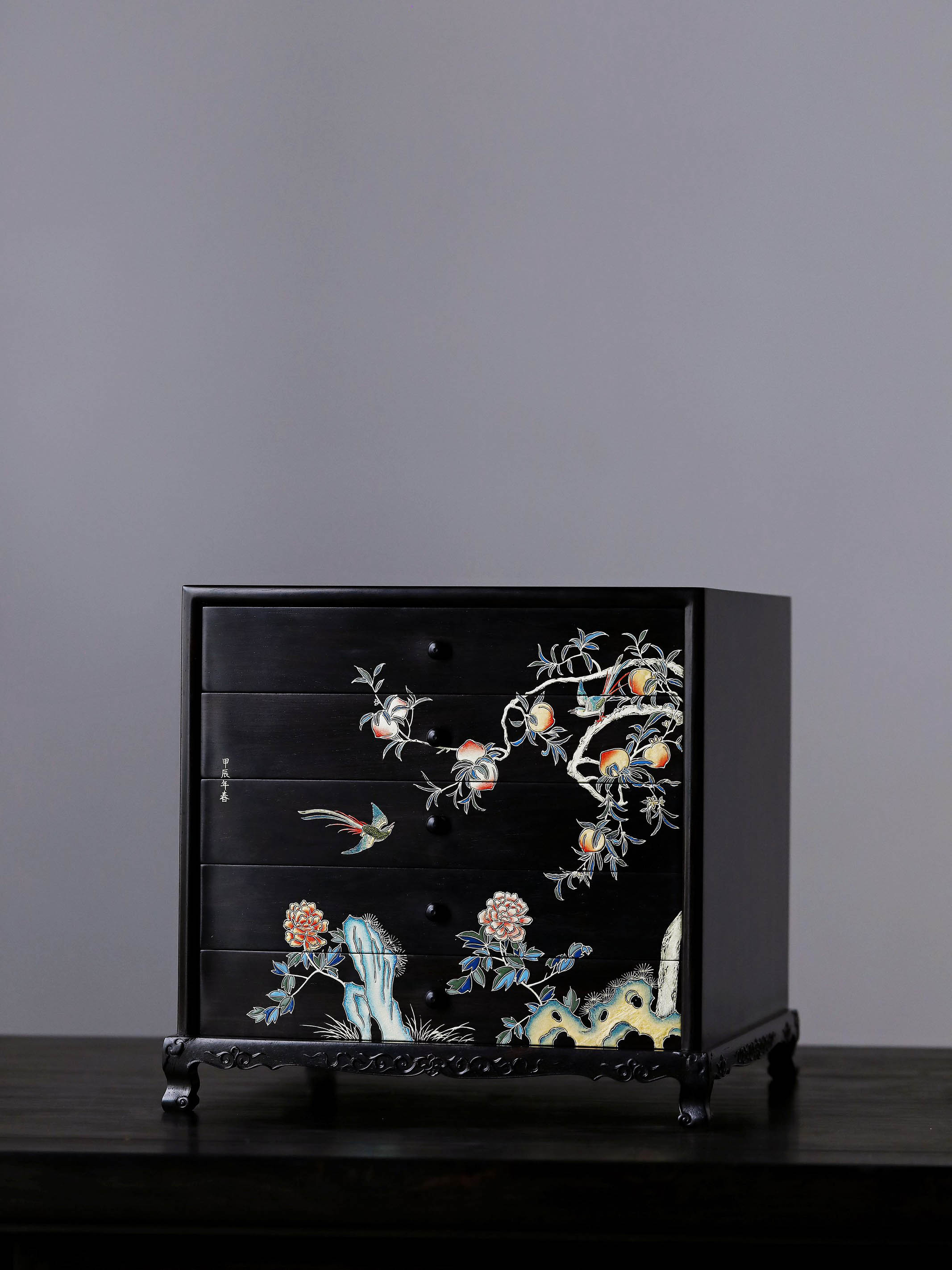 Gold piled high, joy on eyebrows / Wealth and good fortune on the table, five cups of tea on the sideboard