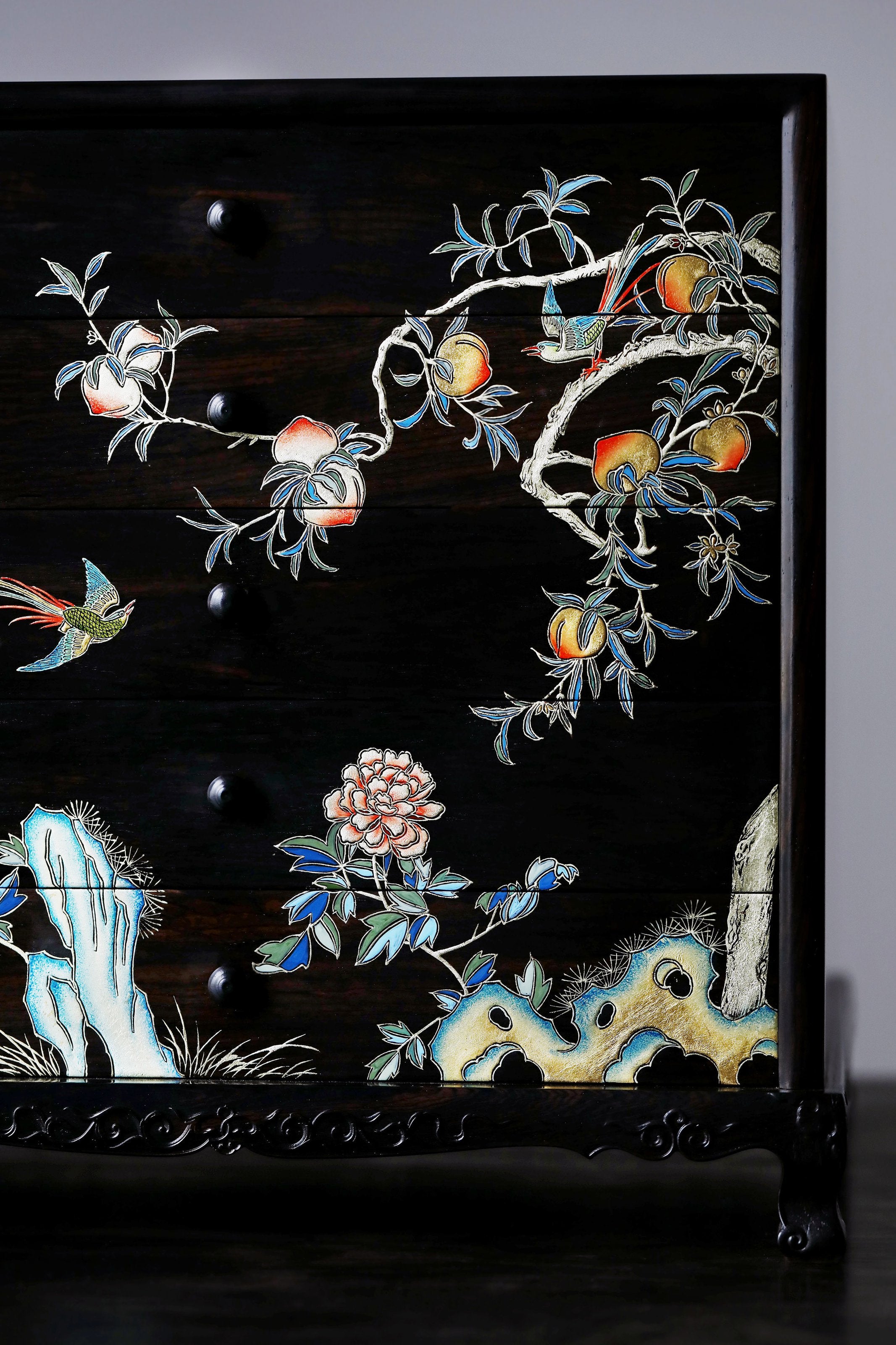 Gold piled high, joy on eyebrows / Wealth and good fortune on the table, five cups of tea on the sideboard