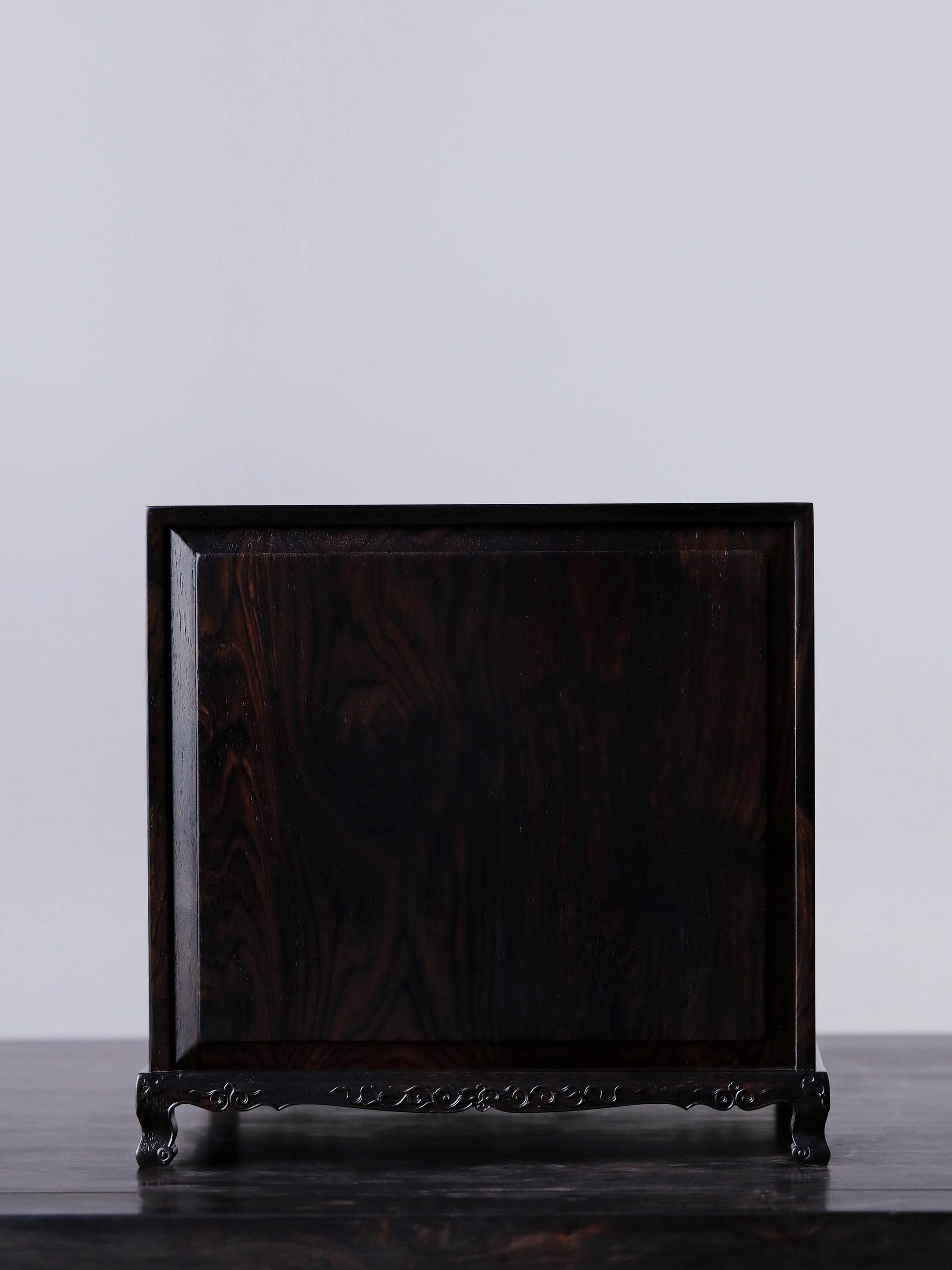 Gold piled high, joy on eyebrows / Wealth and good fortune on the table, five cups of tea on the sideboard