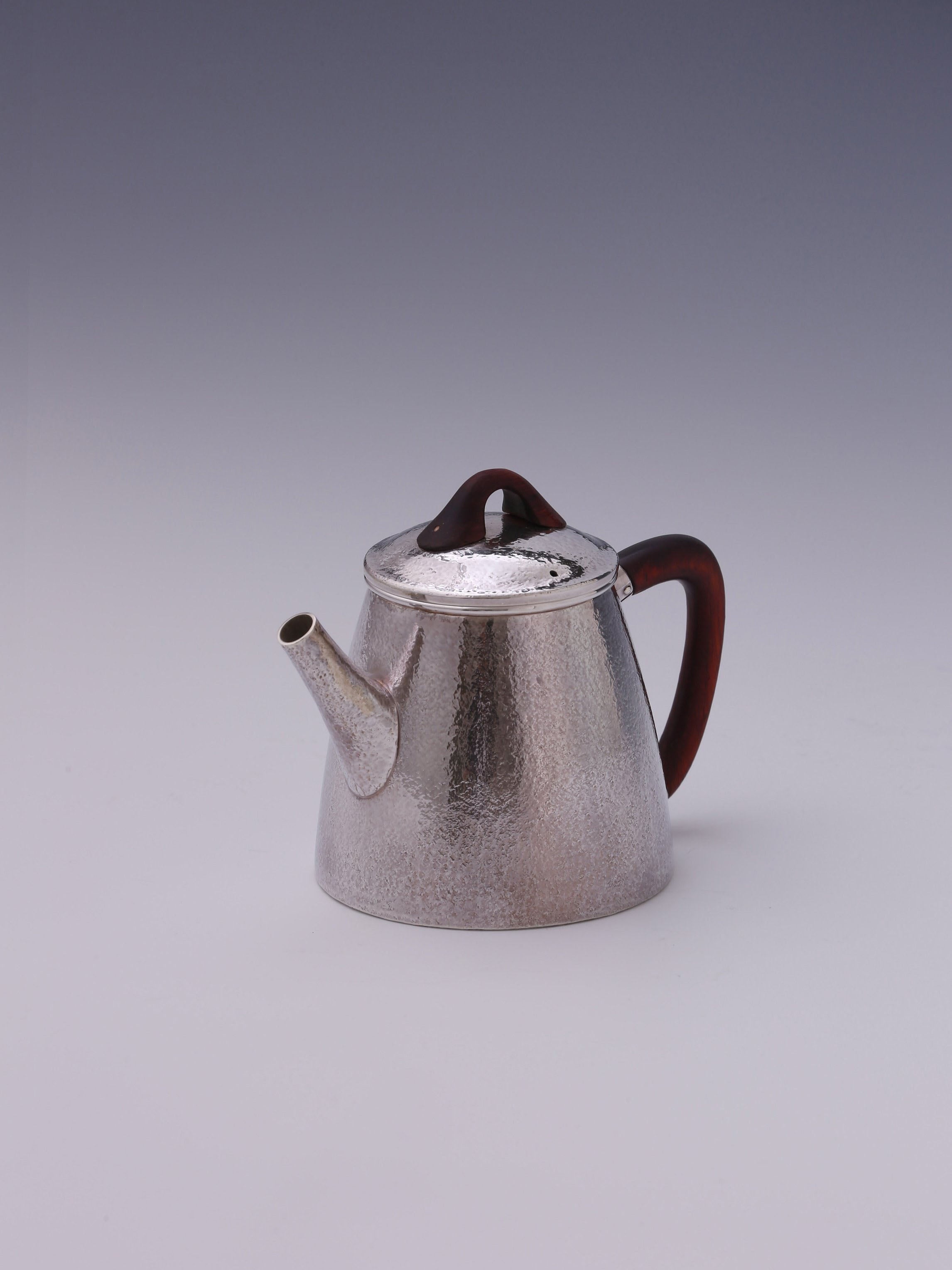 High stone silver tea pot