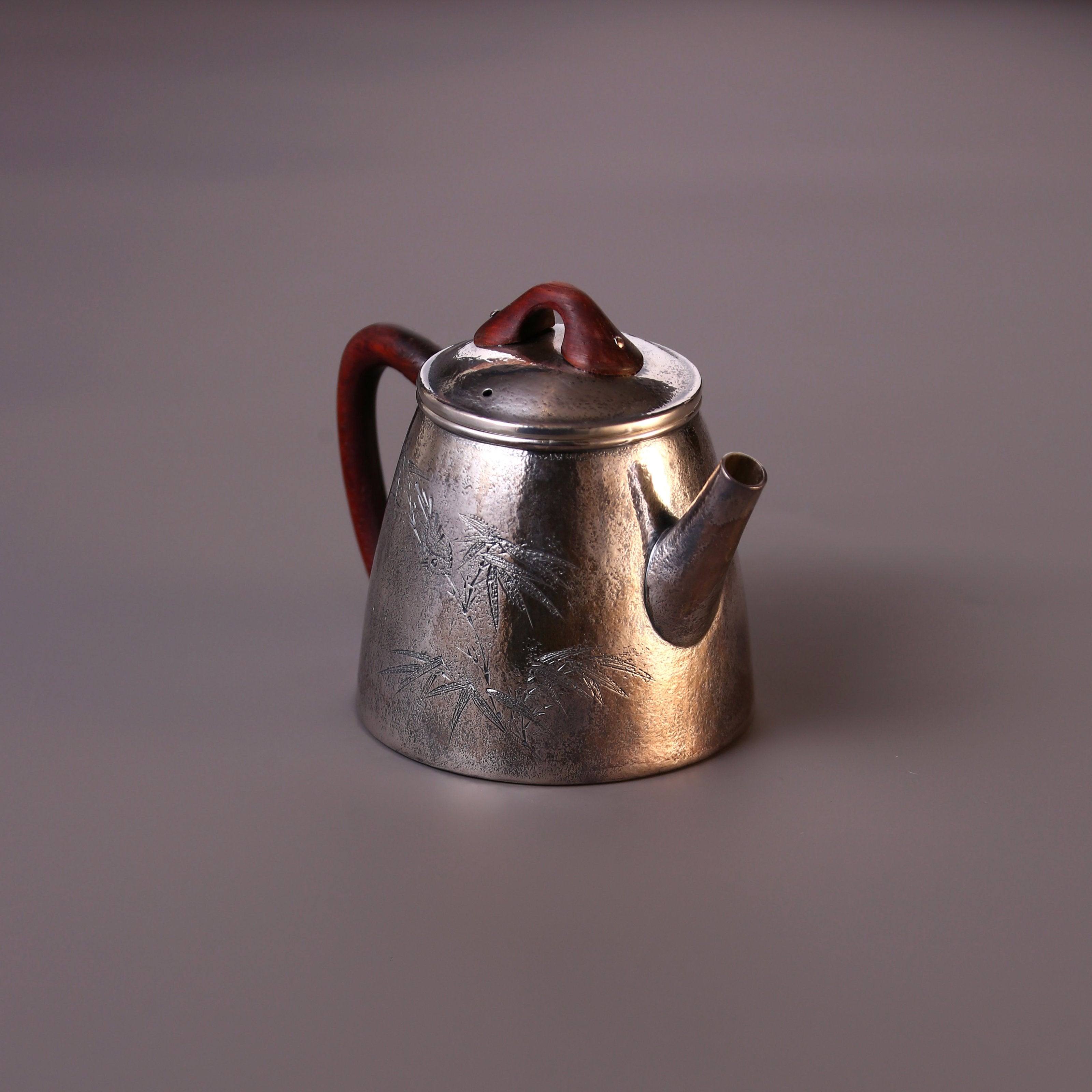 High stone silver tea pot