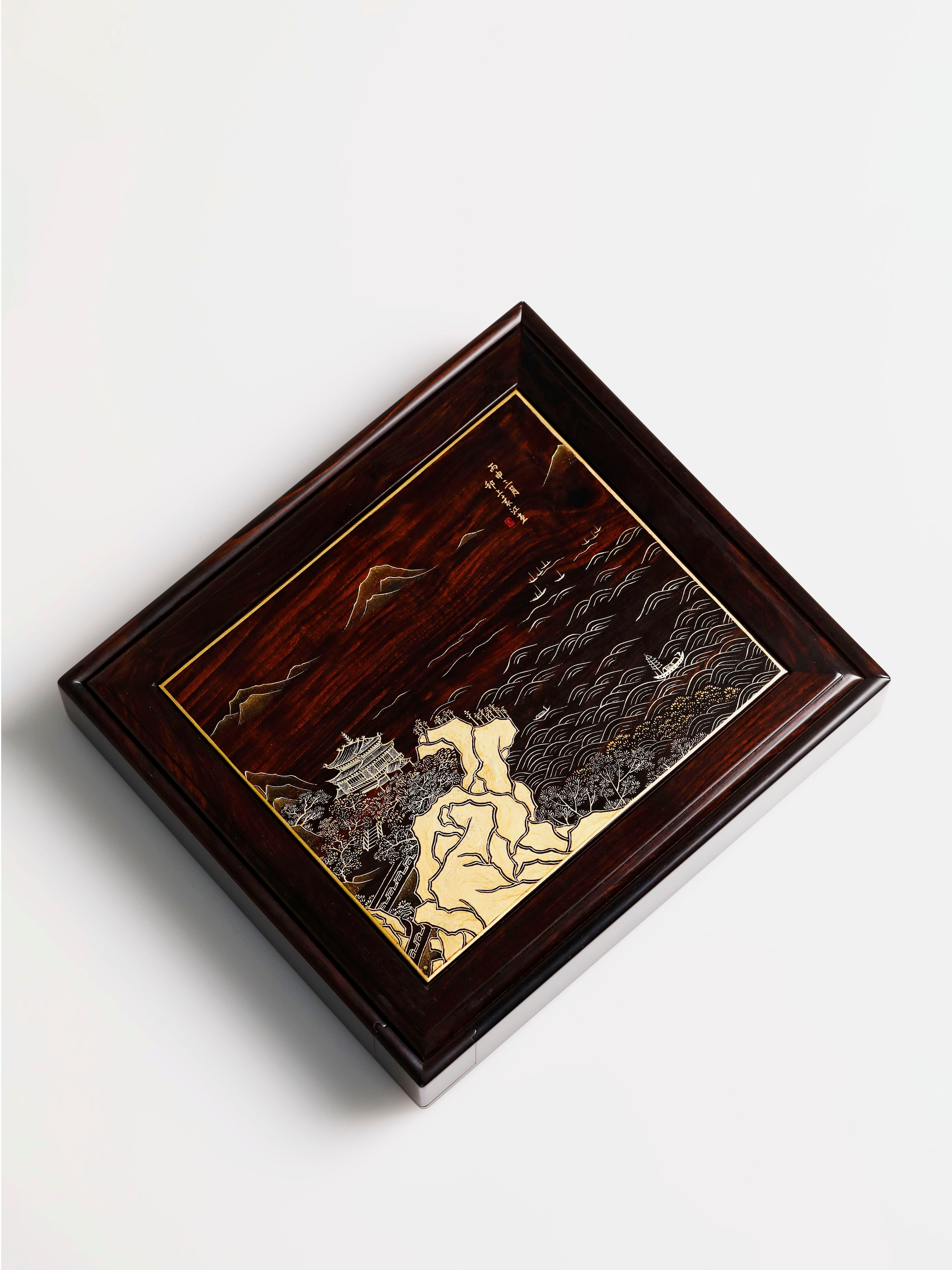 Purple sandalwood tea box with gold-painted "Watching the Tide" design