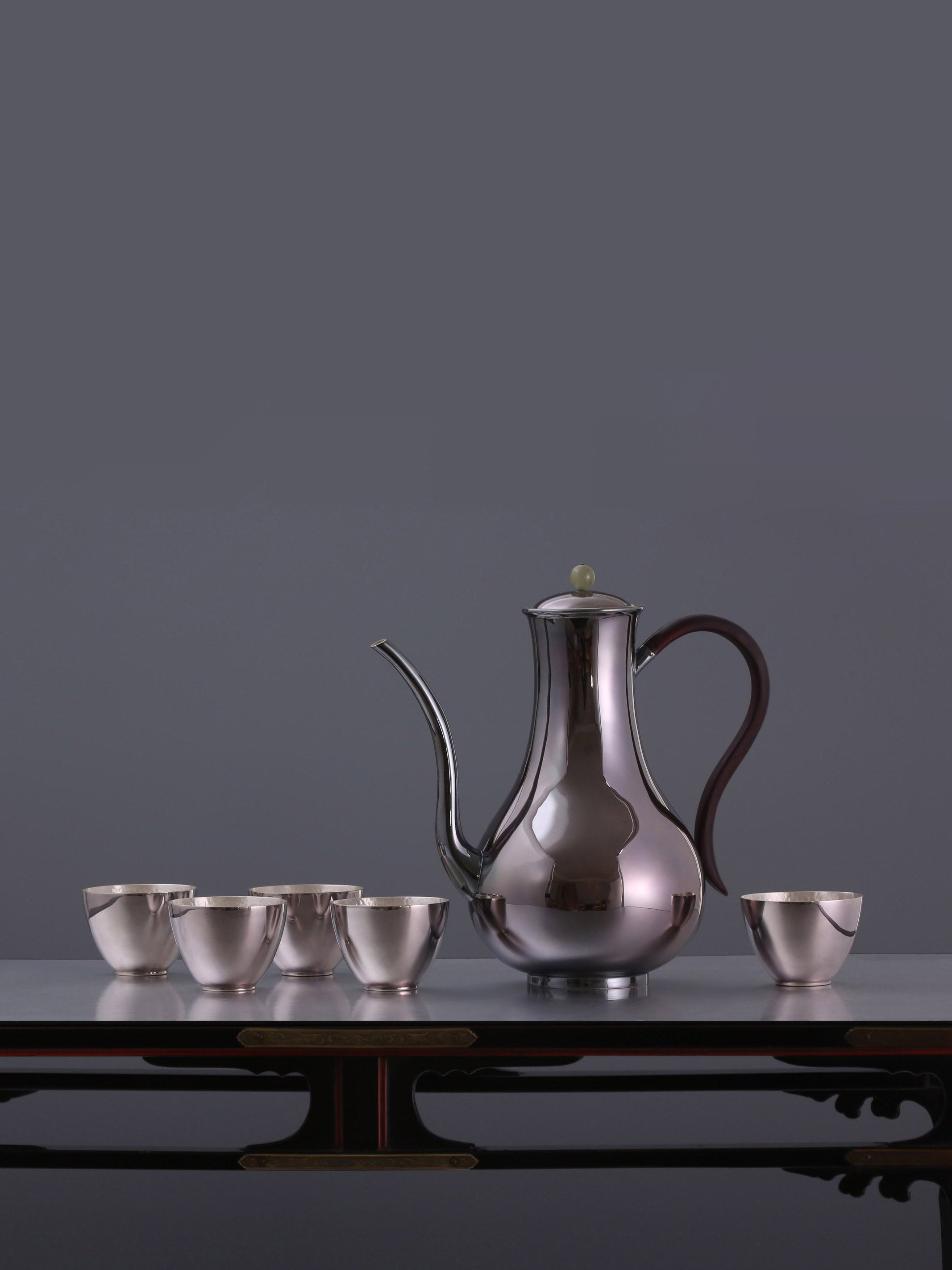 Polished sterling silver flask/glass