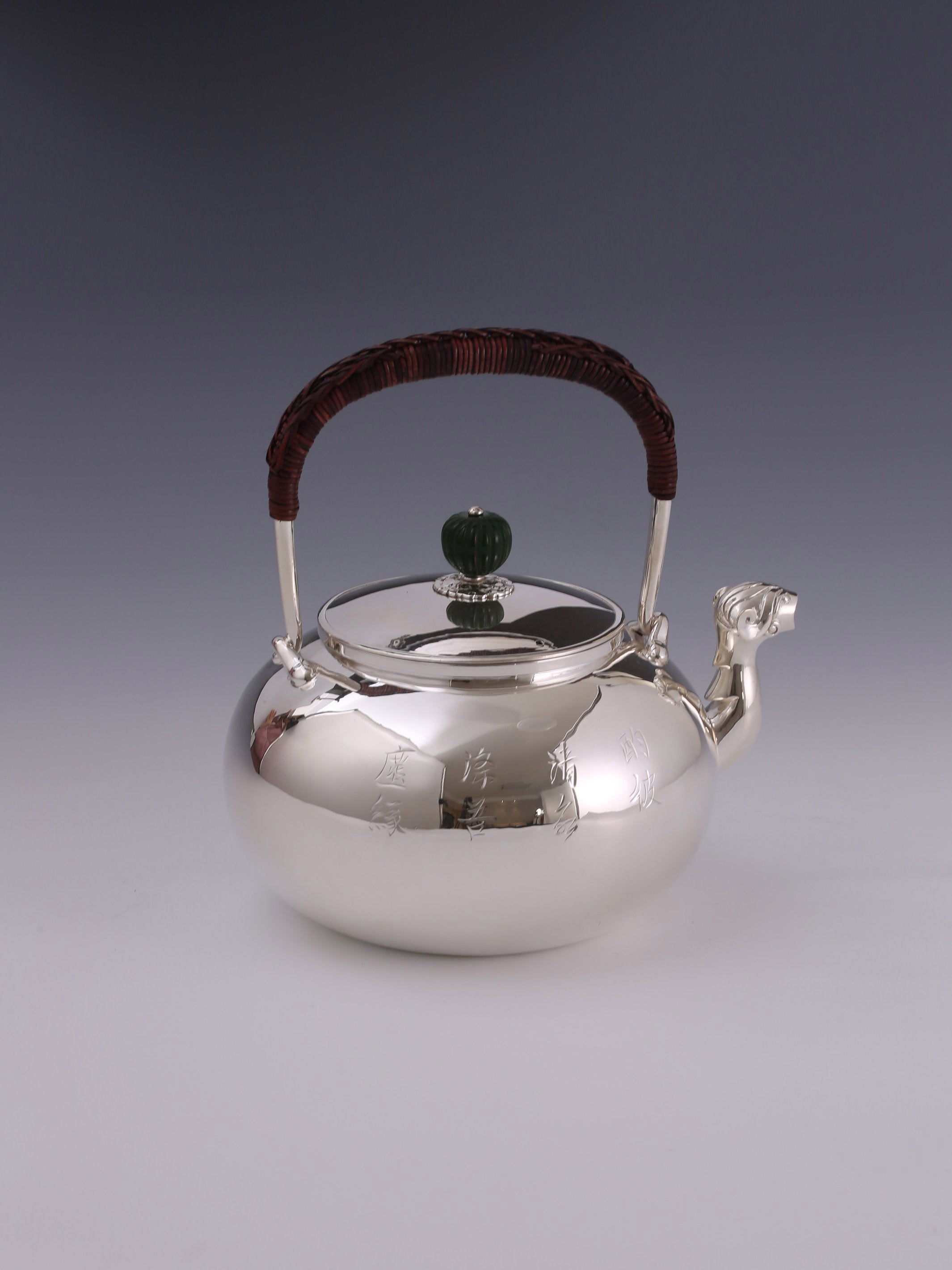 Plain silver ewer with animal-shaped mouth