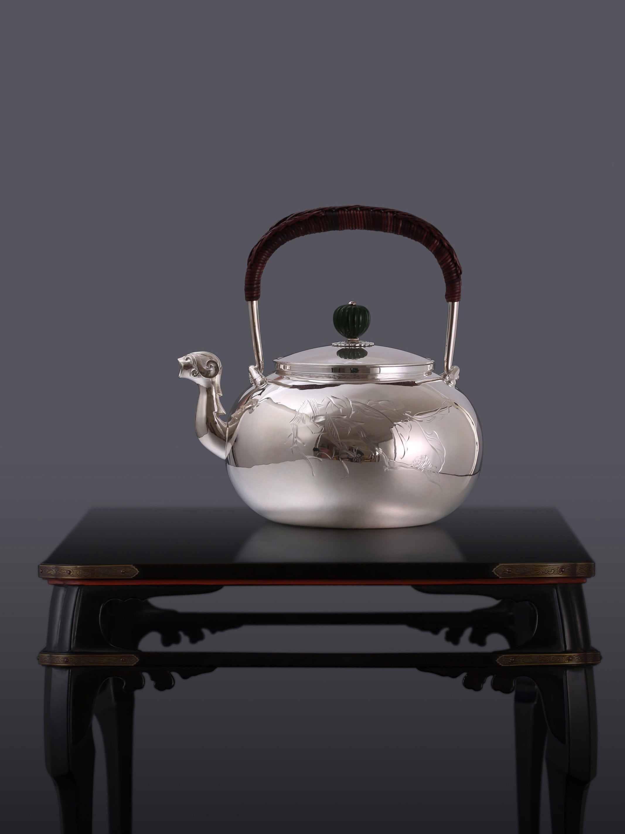 Plain silver ewer with animal-shaped mouth