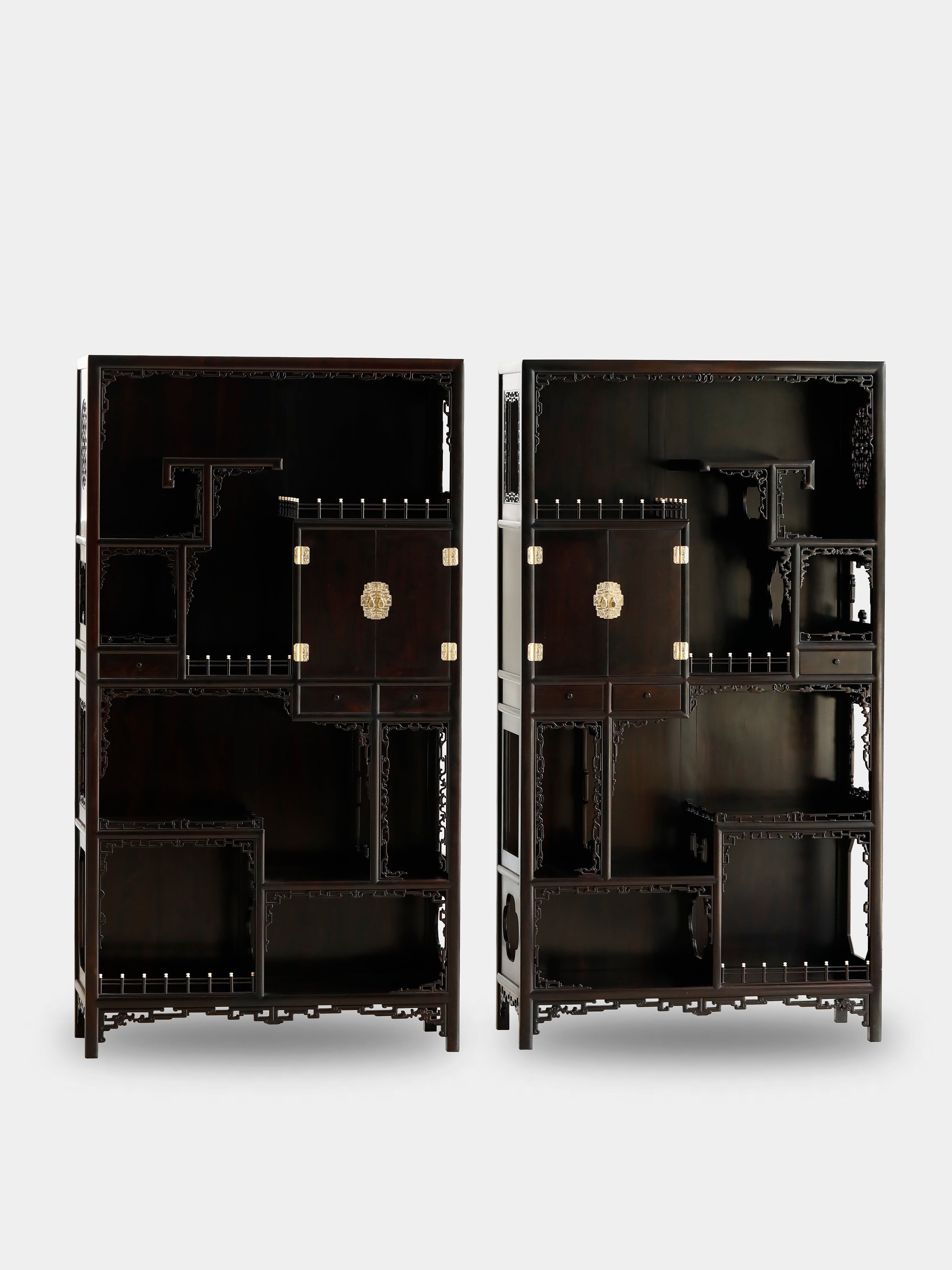 A pair of antique display shelves