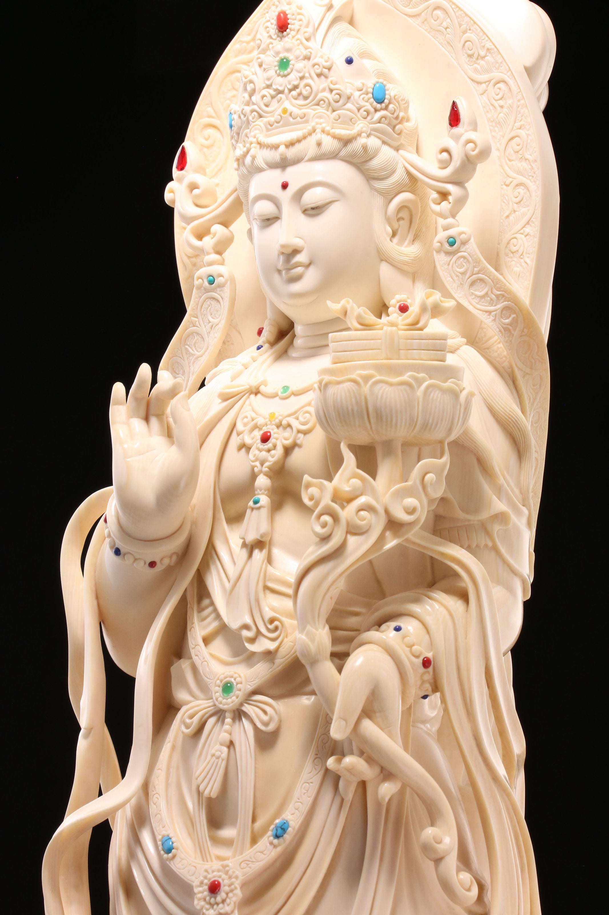 Guanyin holding a lotus and riding a dragon