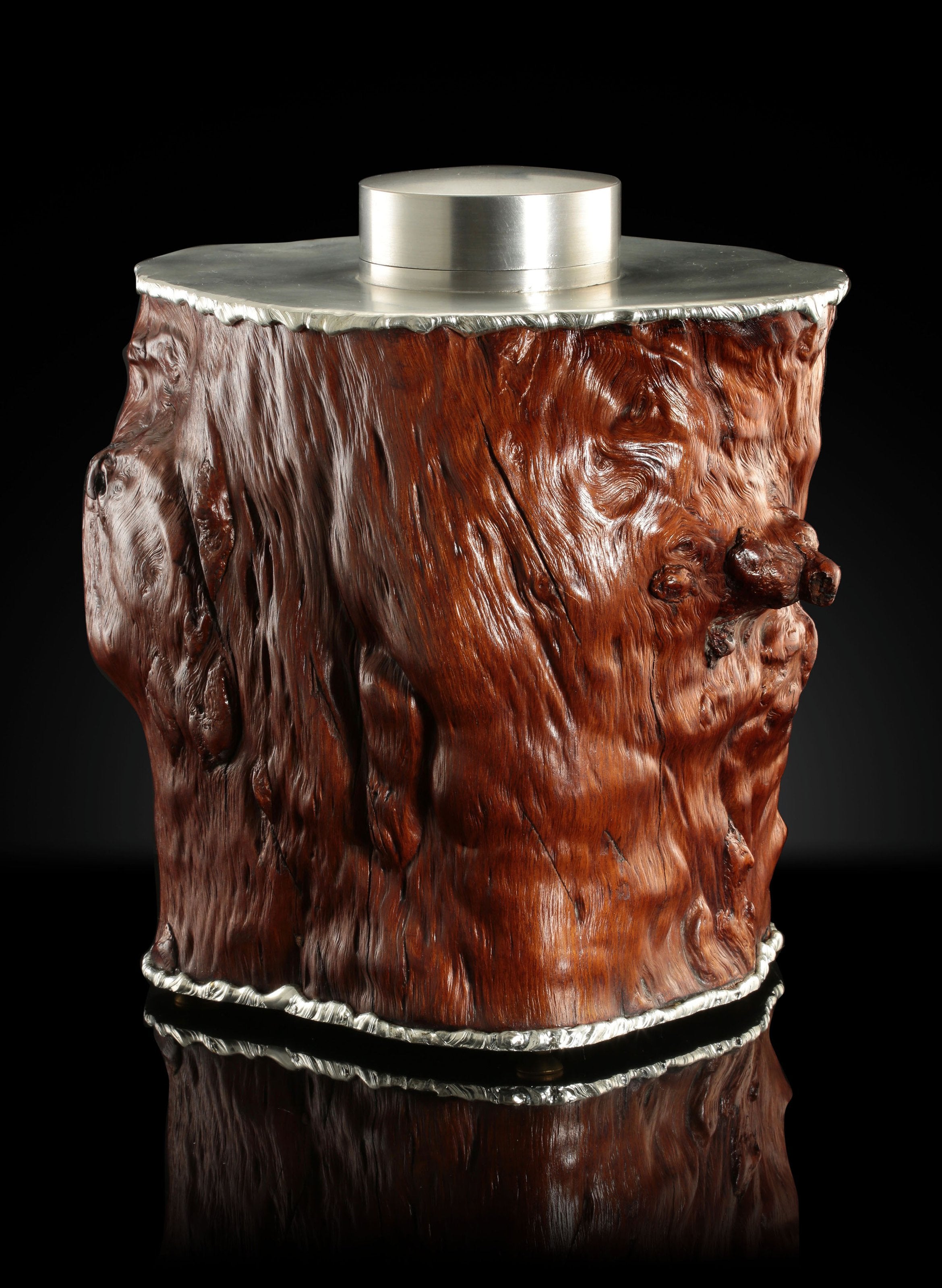 Tough and sturdy tin-carved burl wood tea caddy